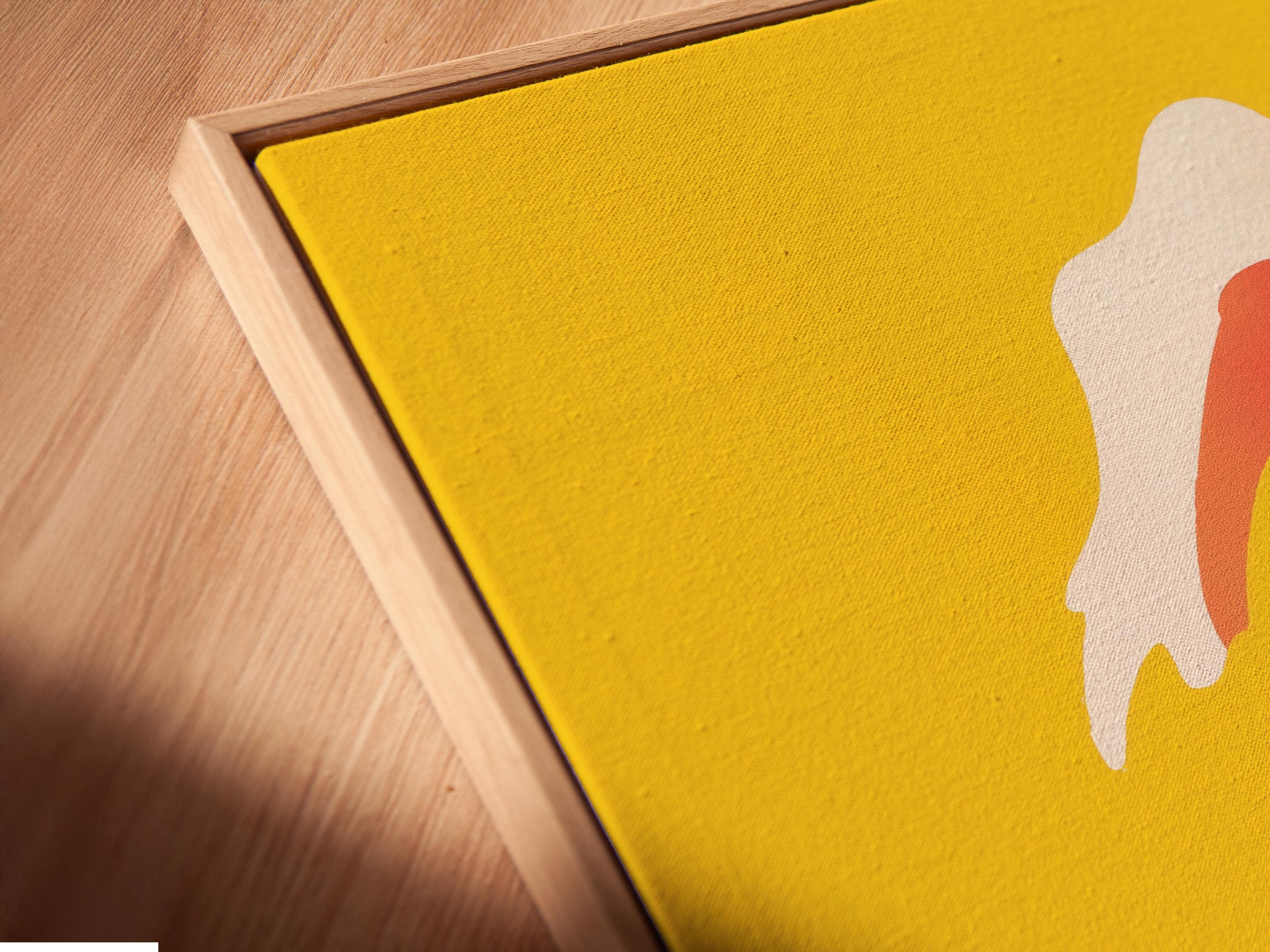 Stylised surfer silhouette on a white surfboard riding red and off-white waves over a yellow background detail view