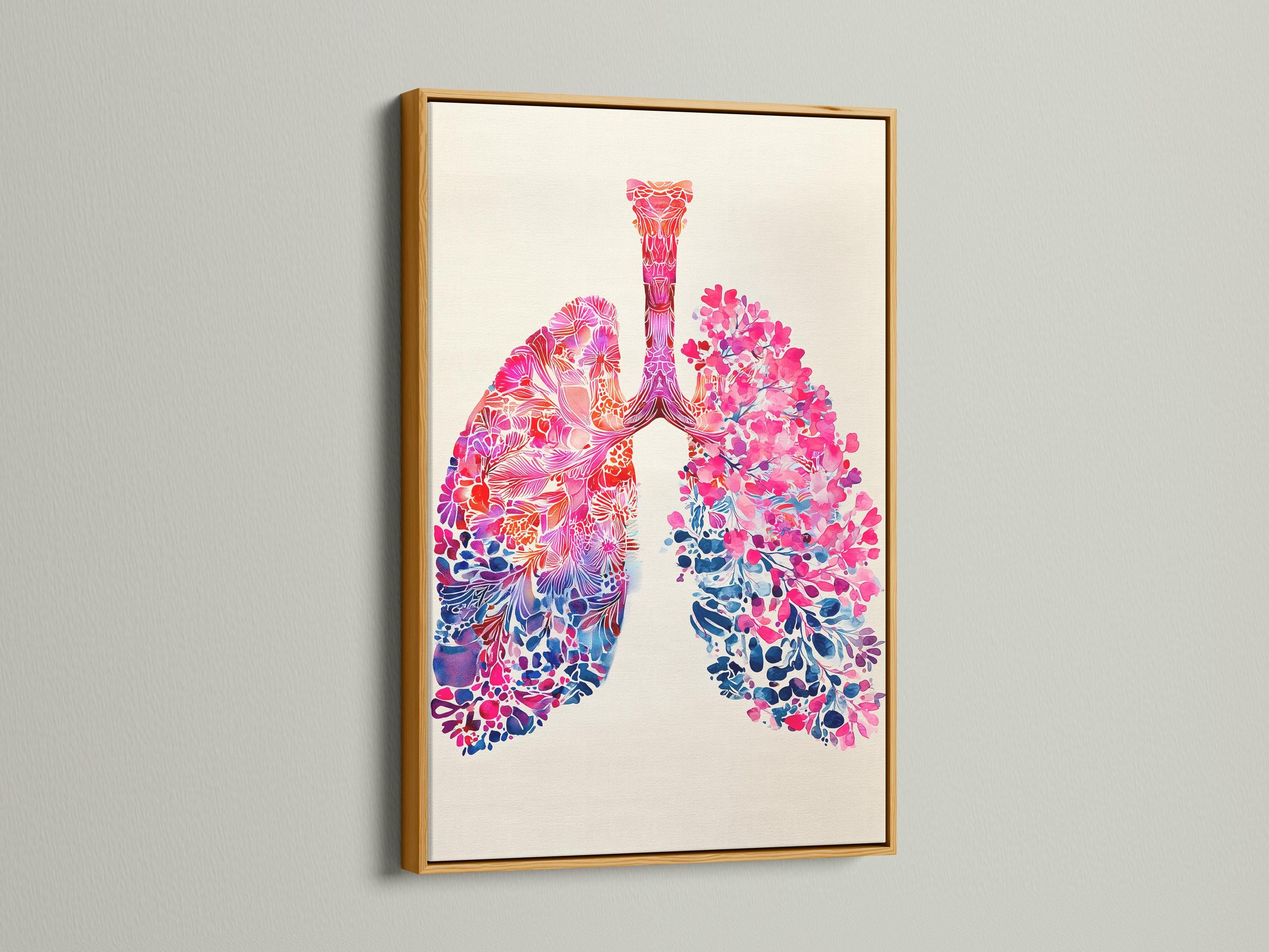 Room mockup showing a framed floral lungs artwork with pink and blue anatomy details