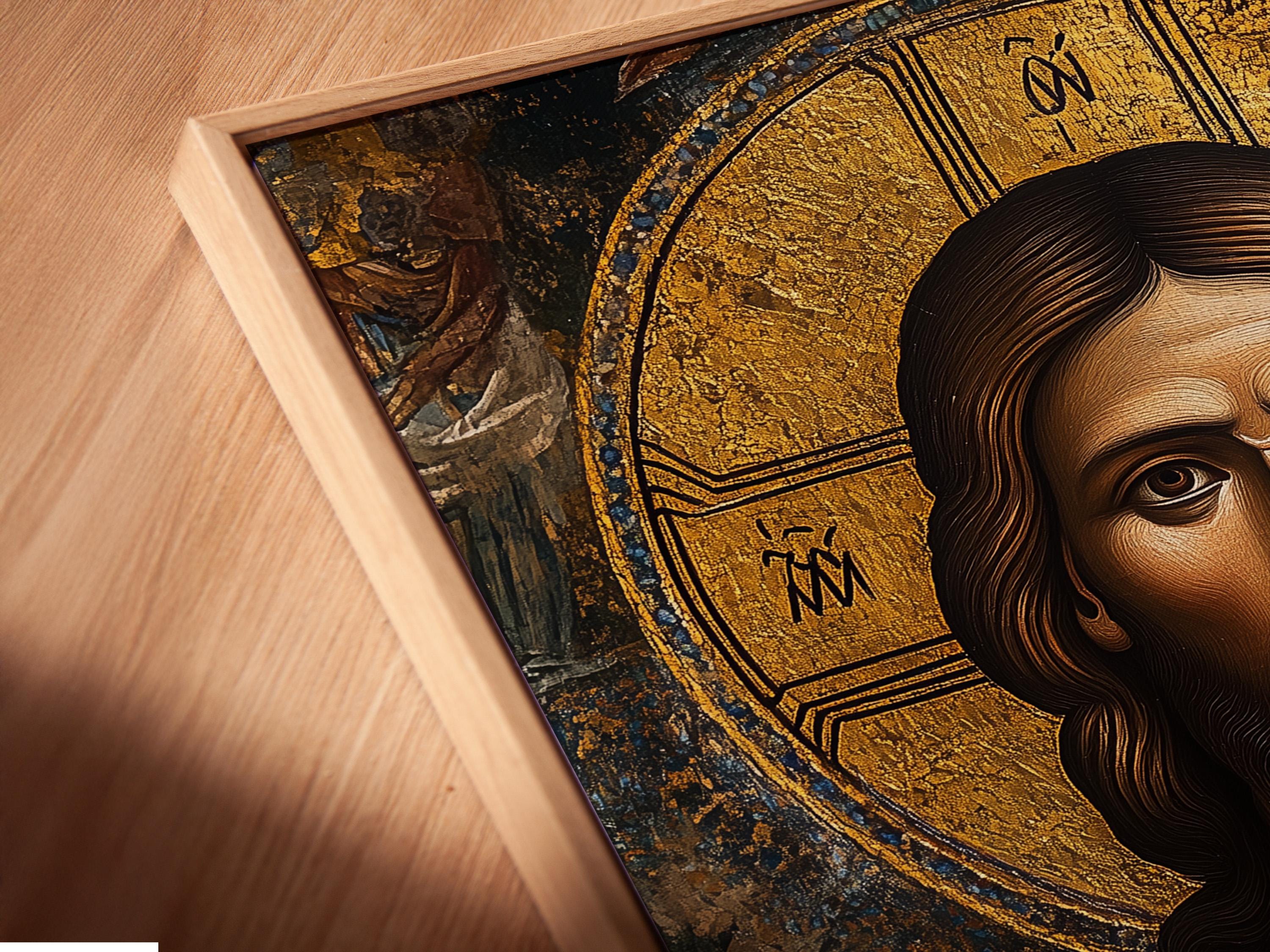 Byzantine-style portrait of Jesus Christ with a gold halo and textured dark background detail view