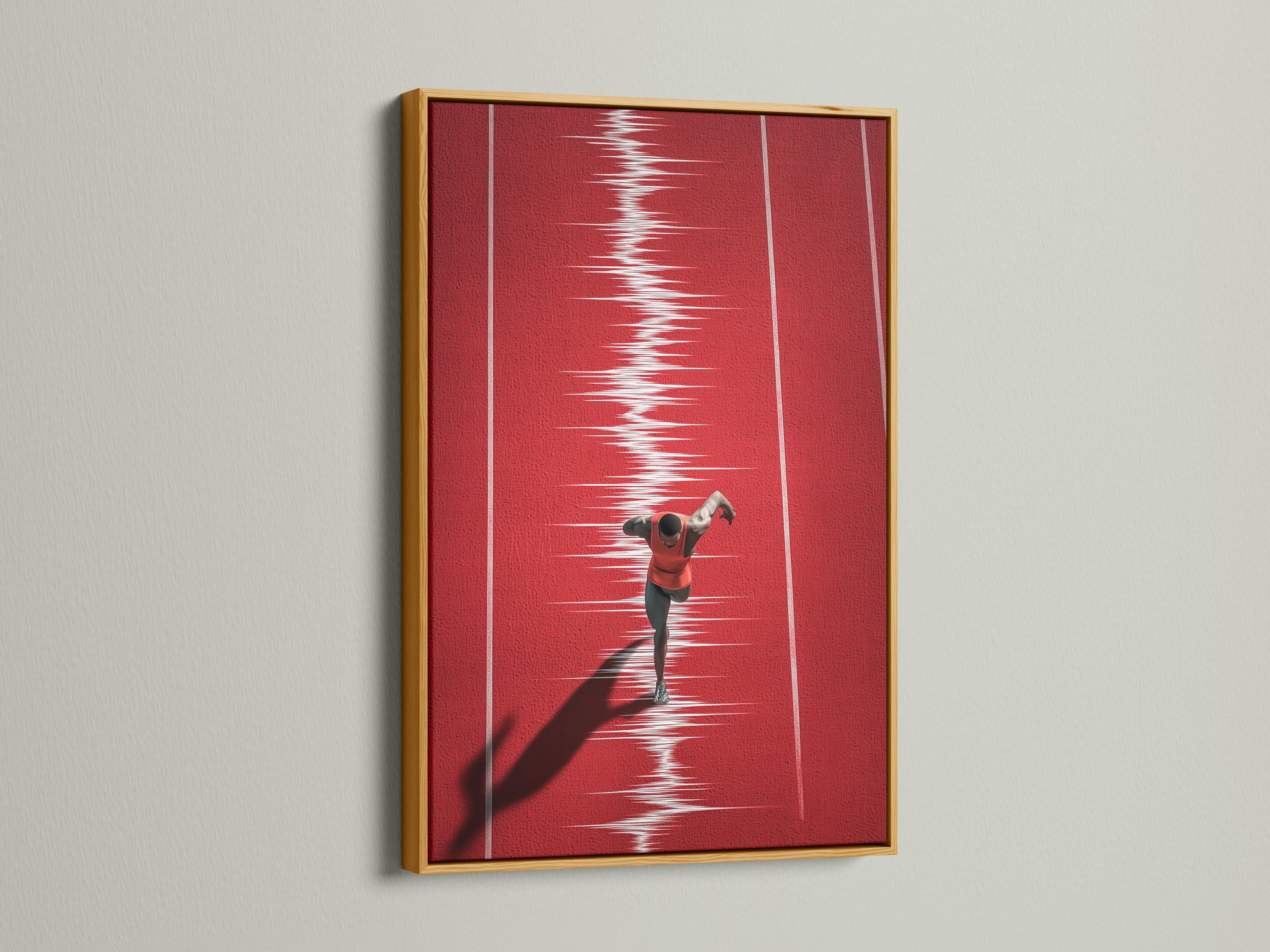 Mockup showing a framed red runner track artwork on a light wall