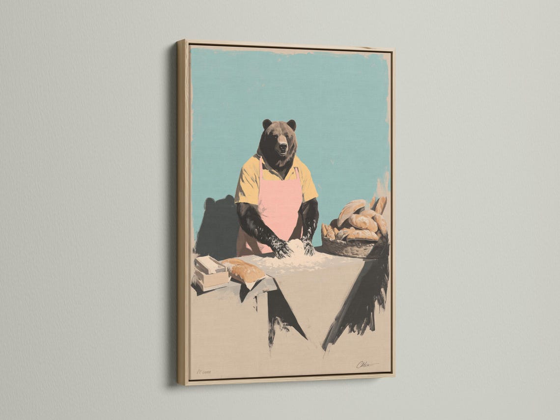 Bear chef illustration wearing a pink apron behind a counter with bread on a teal background detail view