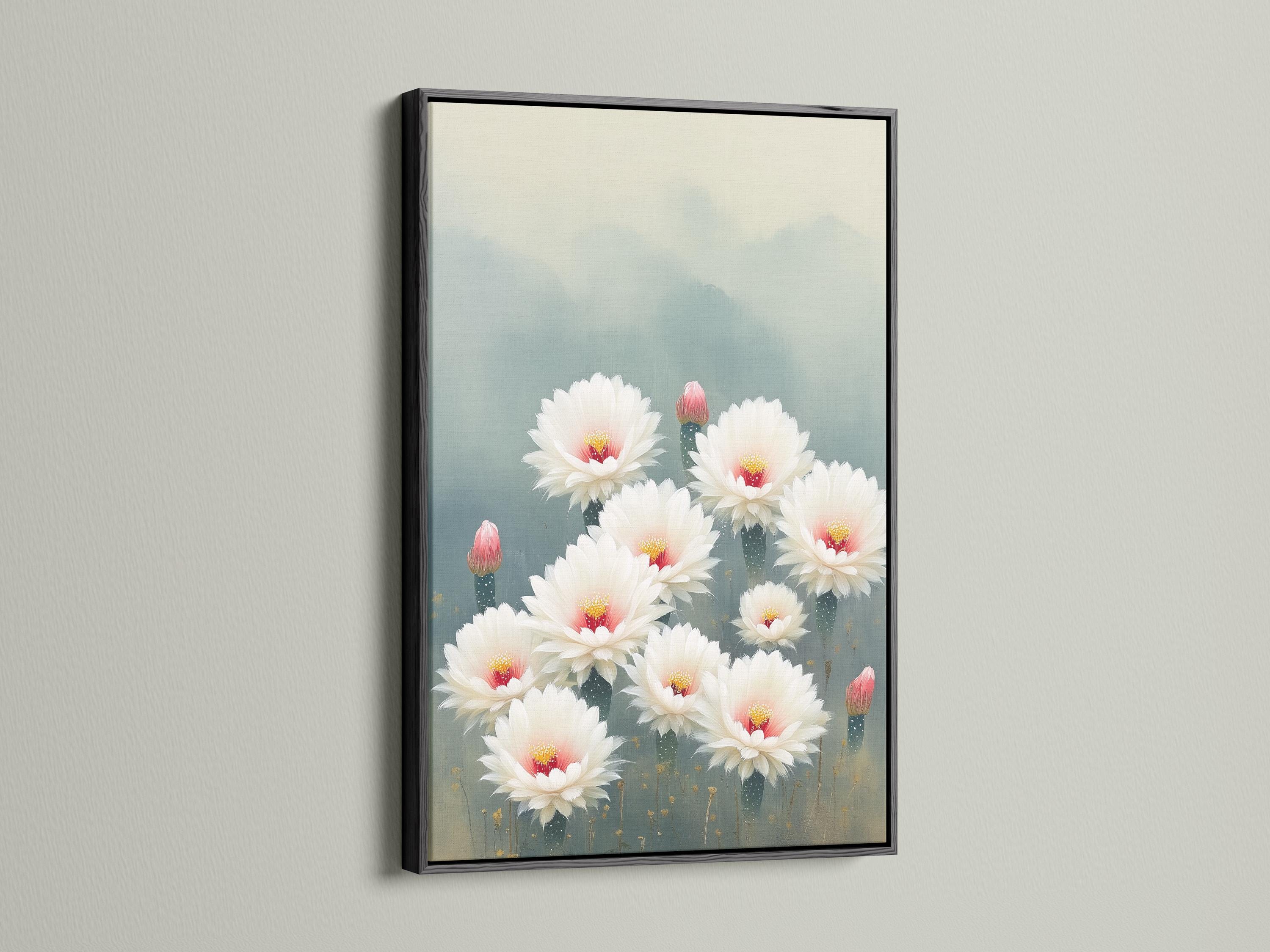 White cactus flowers with pink-red centres and gold specks on a blue-grey background detail view