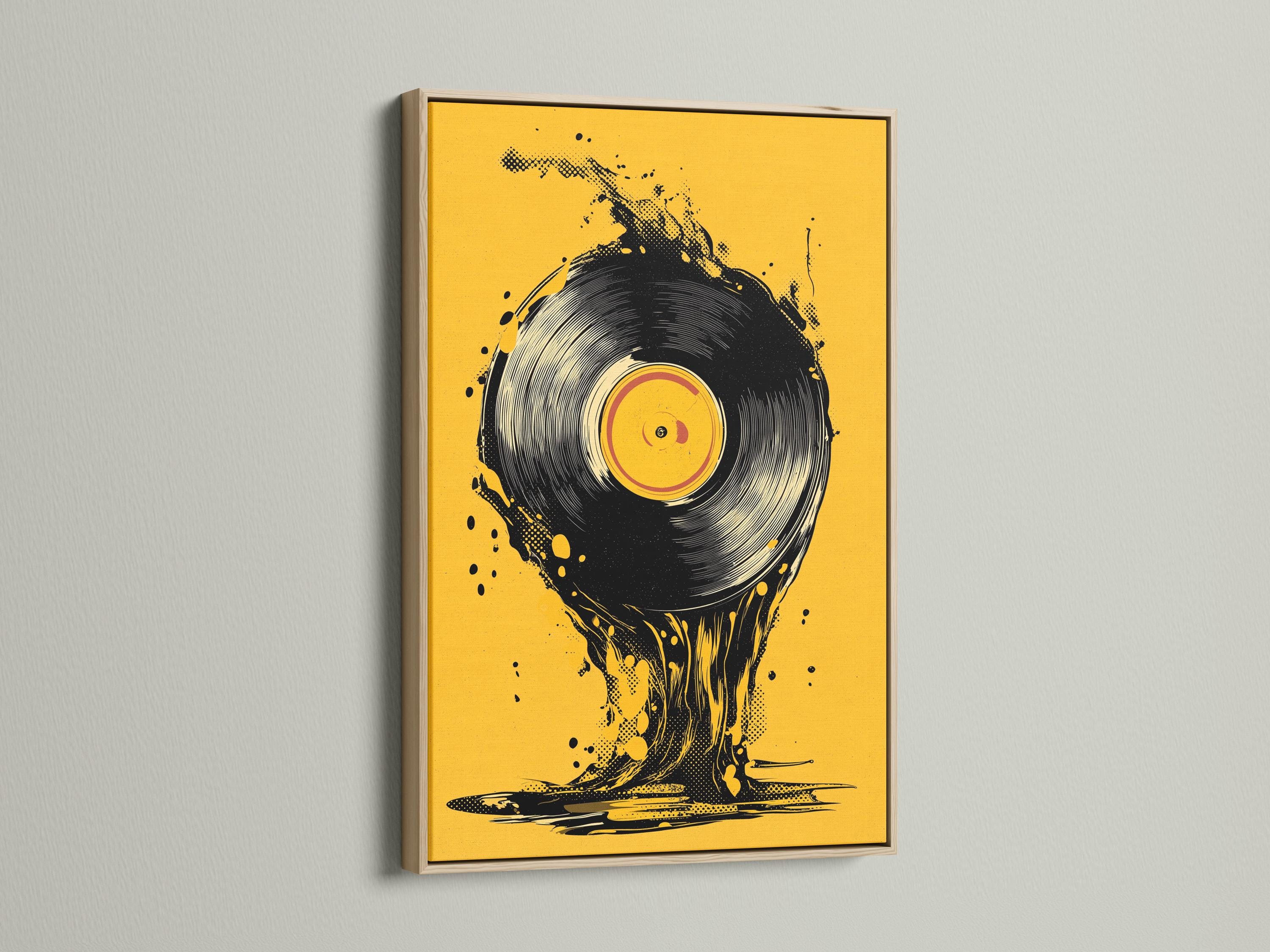 A man wearing headphones beside a music setup with a vinyl record artwork on a wall