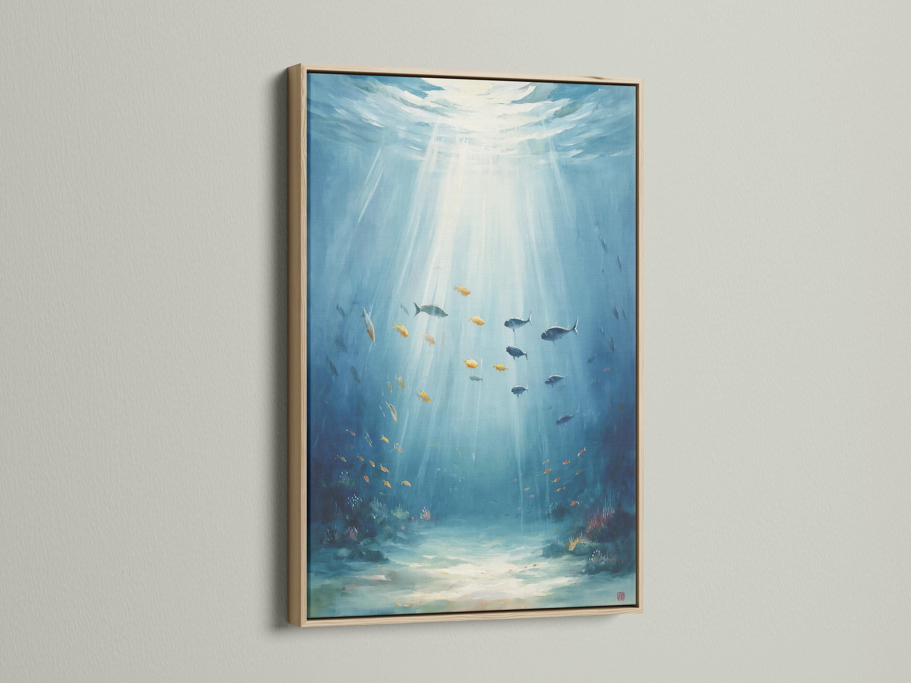 Bathroom wall mockup showing framed underwater fish artwork in aqua and blue