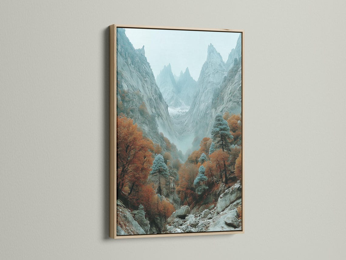 Misty mountain valley with rocky cliffs, autumn trees, and teal-grey peaks detail view