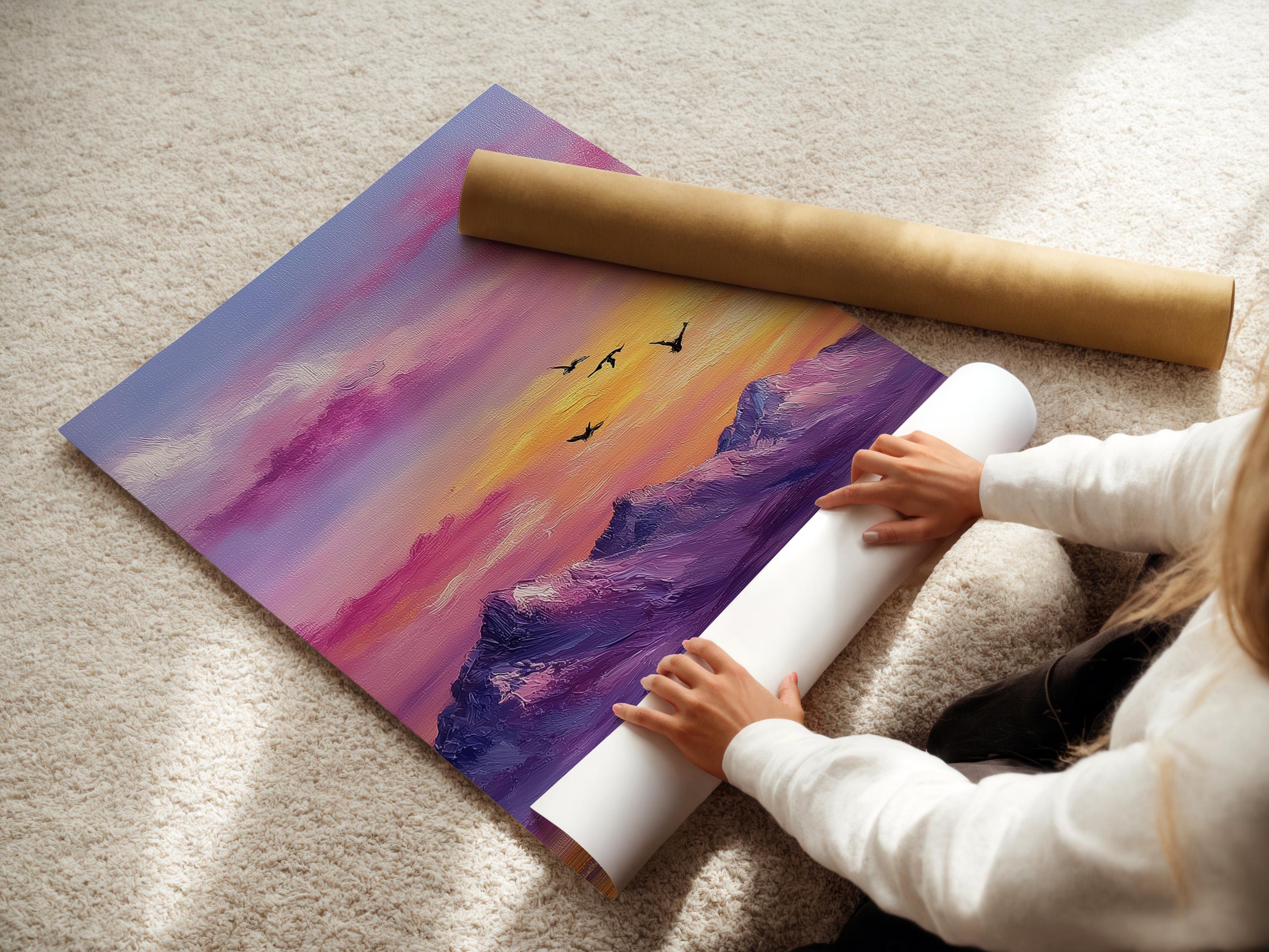 A framed mountain sunset illustration with purple, pink and gold skies and small black birds detail view
