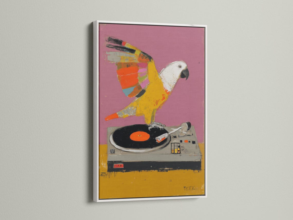 Colourful parrot perched on a turntable above a vinyl record, set against a pink-purple background detail view
