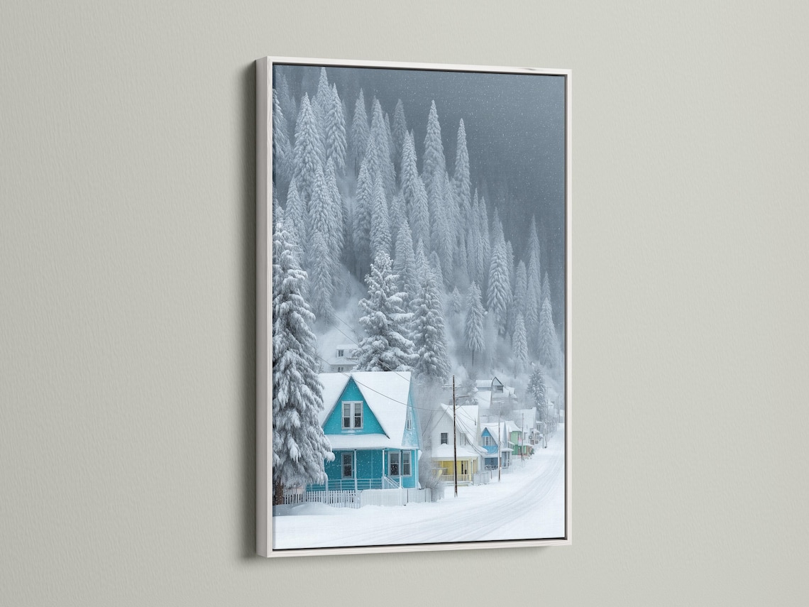 Snowy winter village with pine trees and teal-roof houses in falling snow detail view