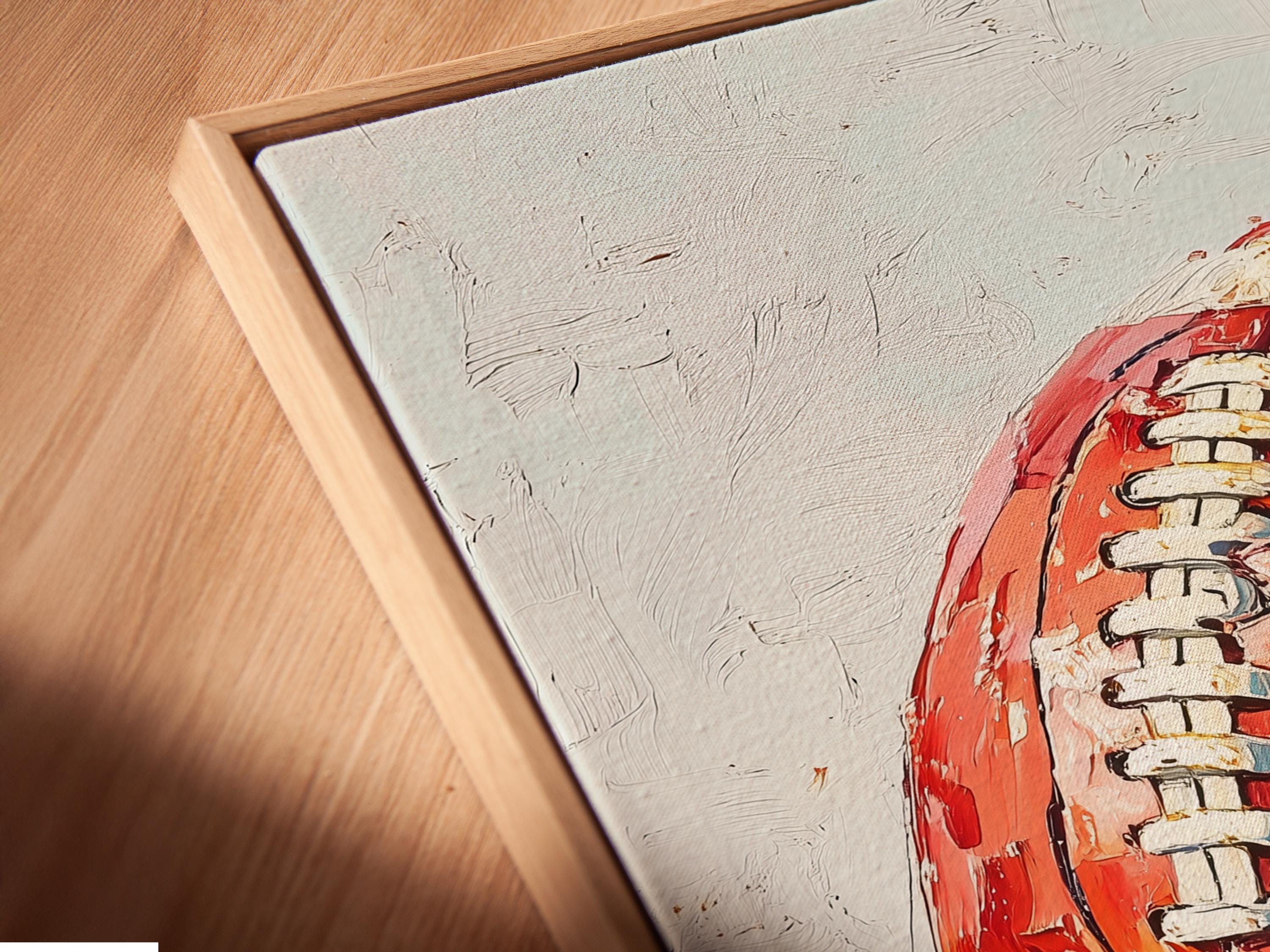 Stylised red and blue football artwork with a helmet-like face and stripe details detail view
