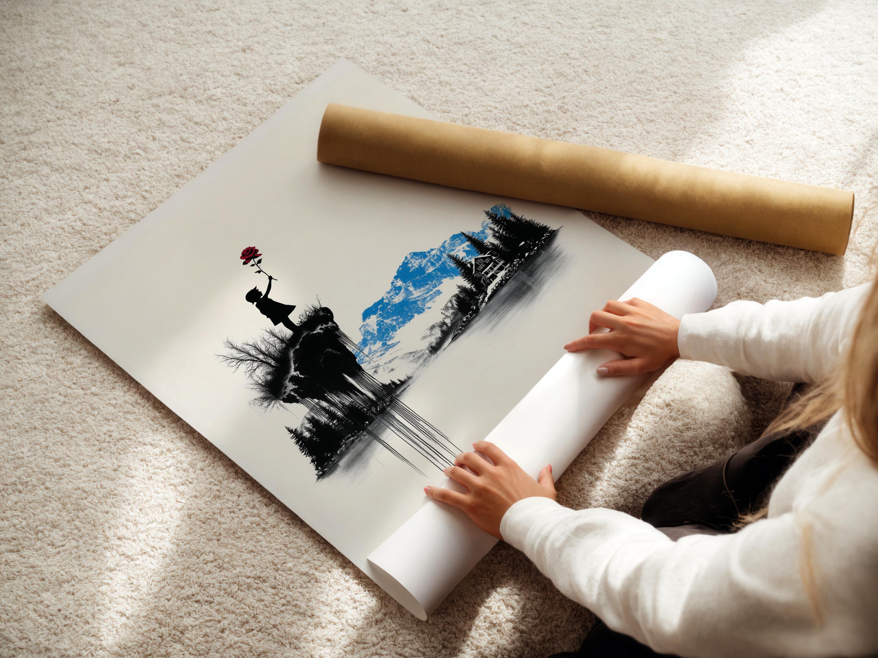 Room mockup showing a framed artwork of a monochrome mountain scene with a girl silhouette holding a red rose