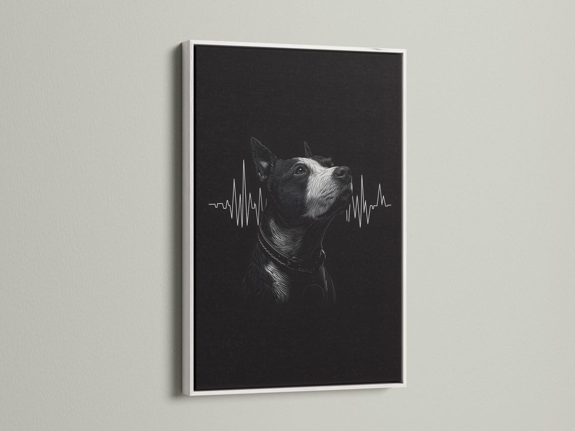 Room mockup showing a framed monochrome dog portrait with a heartbeat waveform on a dark background