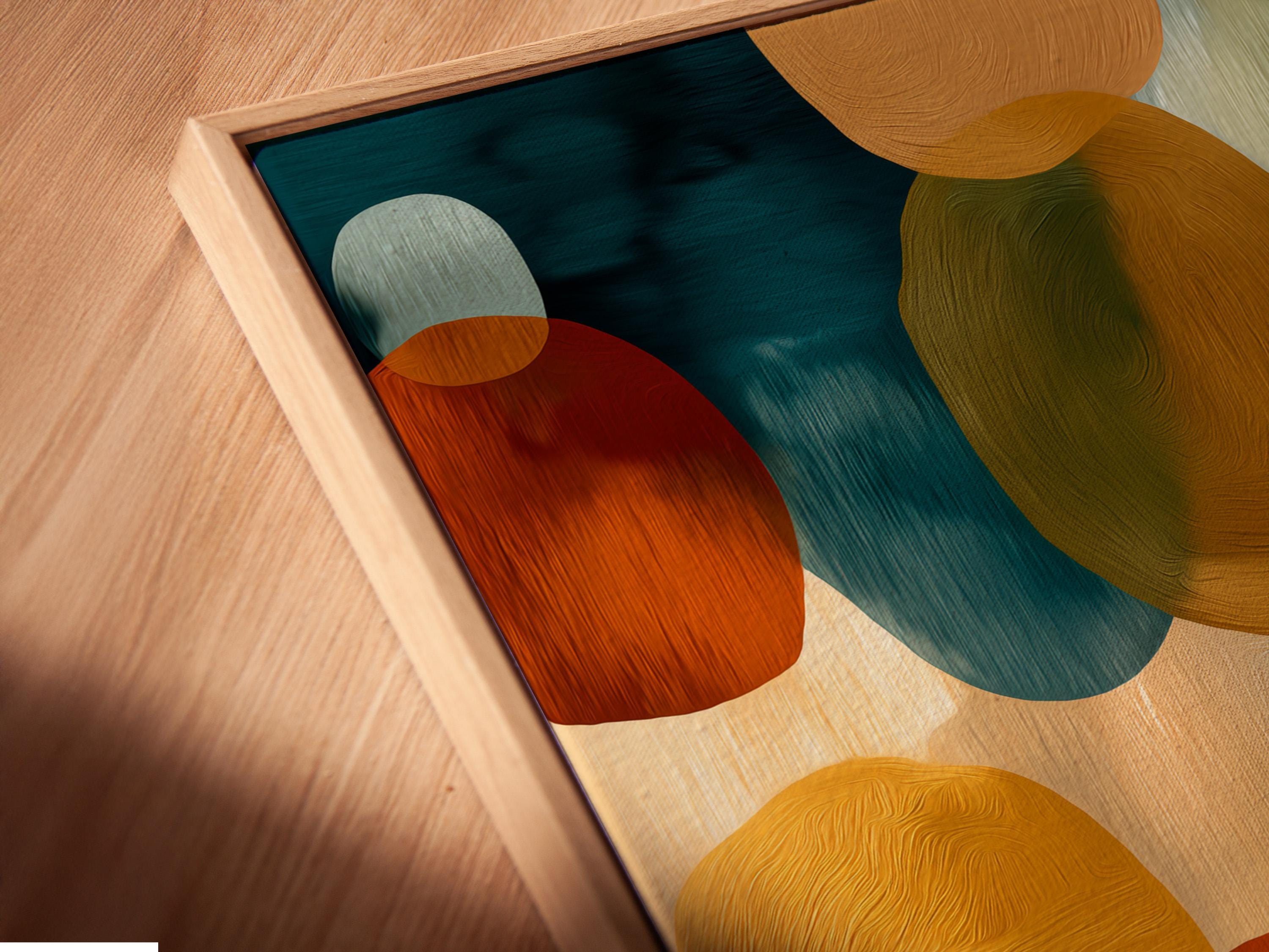 Framed abstract circle artwork with teal, cream, rust and mustard circles on a pale background