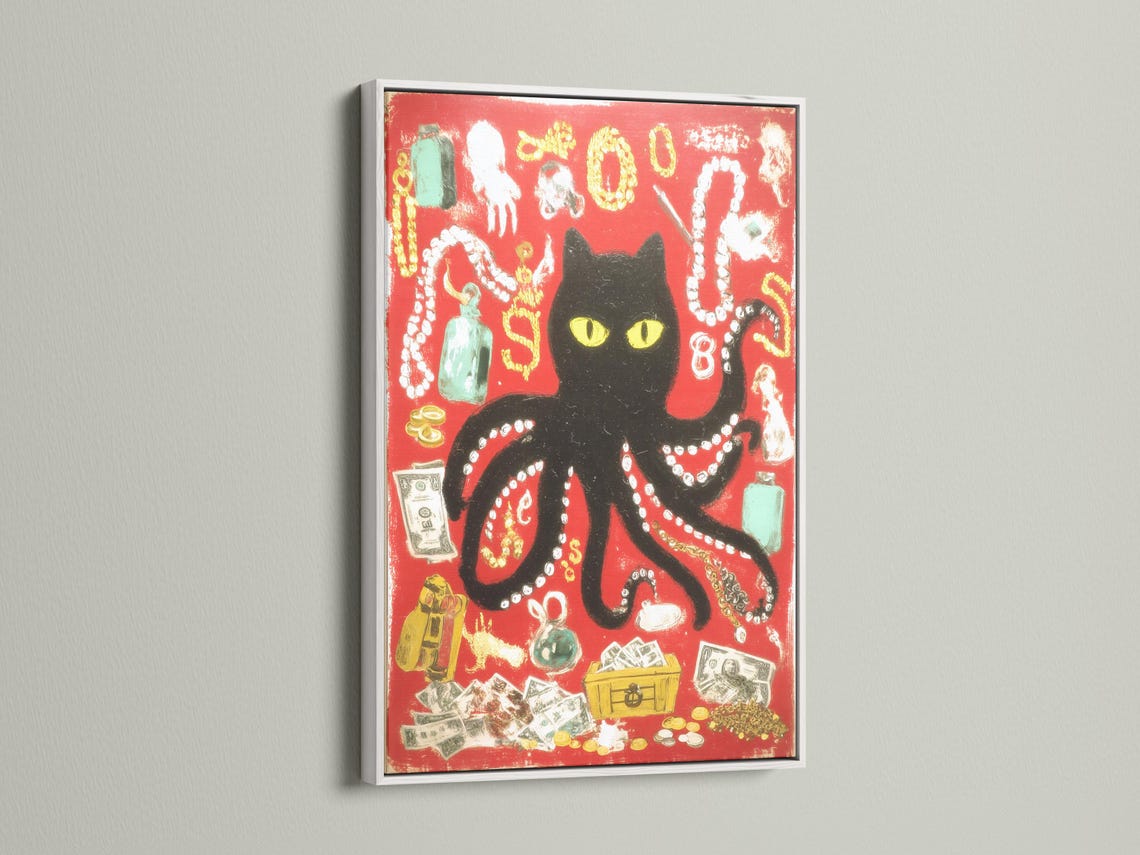 Black cat with yellow eyes in a red octopus-like animal collage with gold and bead-like details detail view