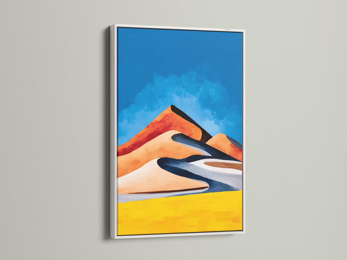 Stylised desert landscape with blue sky, orange dunes, dark navy shadows and golden yellow ground detail view