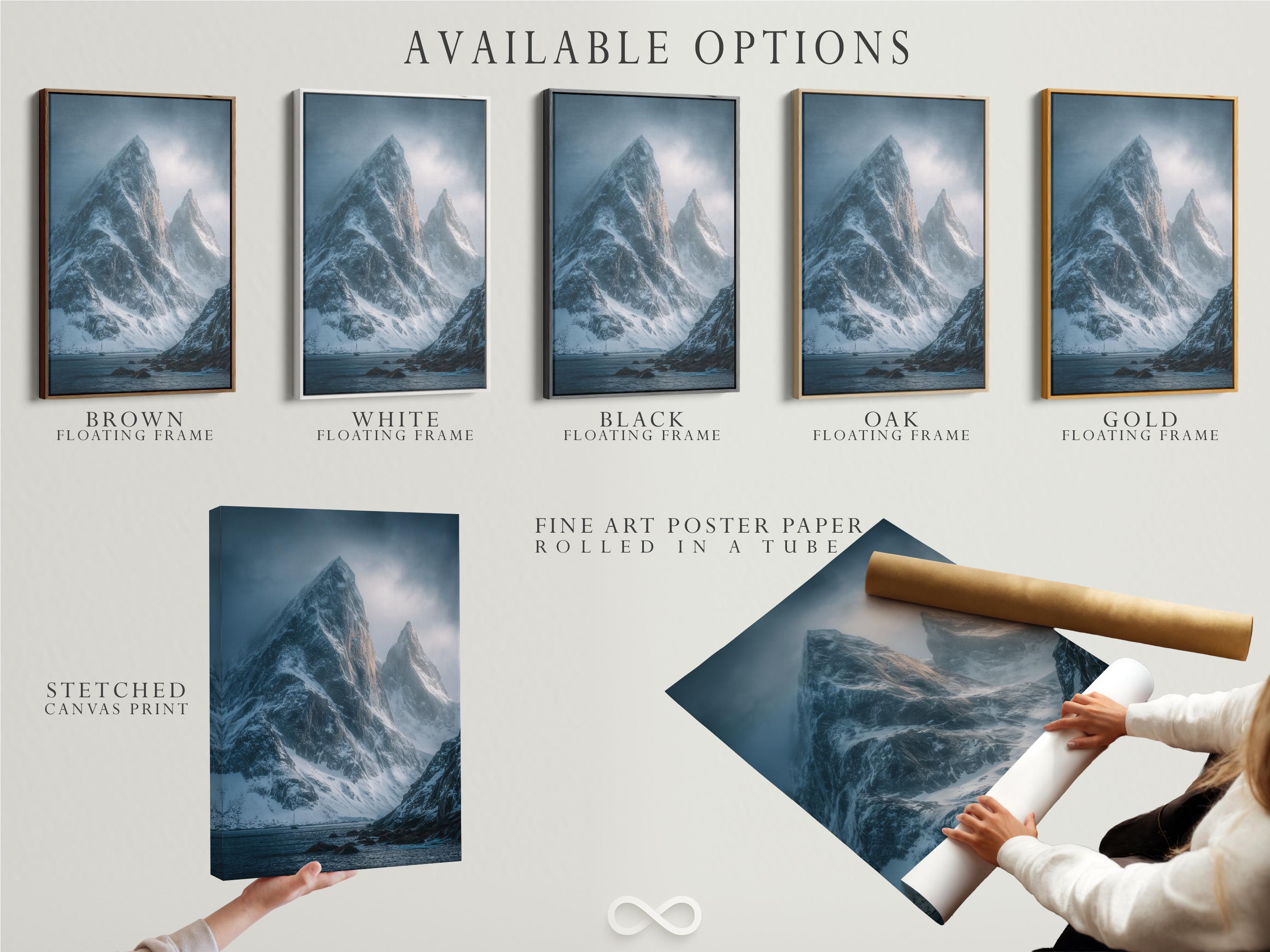 Blue misty mountain landscape with snow peaks, cloudy sky, and dark rocky shoreline detail view