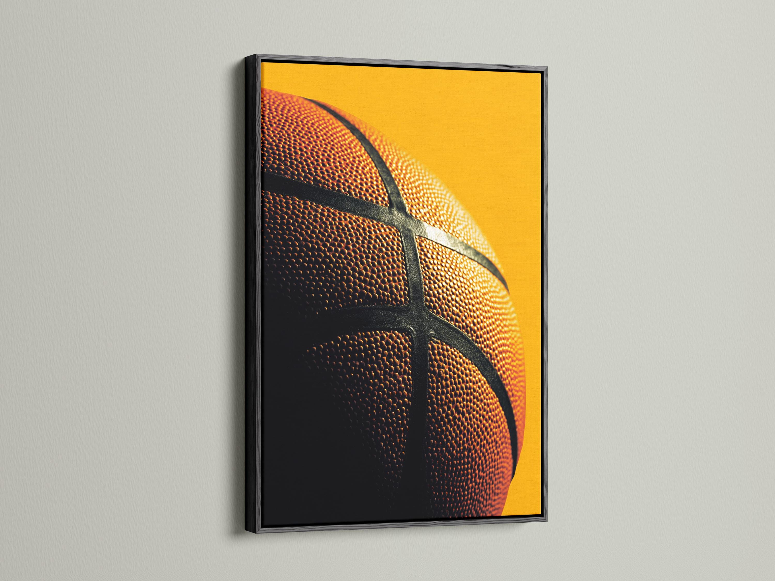 Close-up basketball surface with orange dimples and dark curved grooves