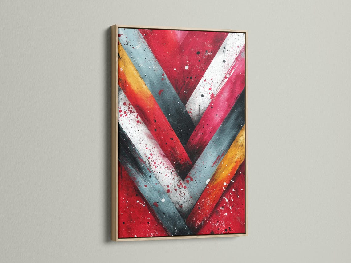 Abstract chevron V shape in red, teal and warm yellow with speckled dots detail view