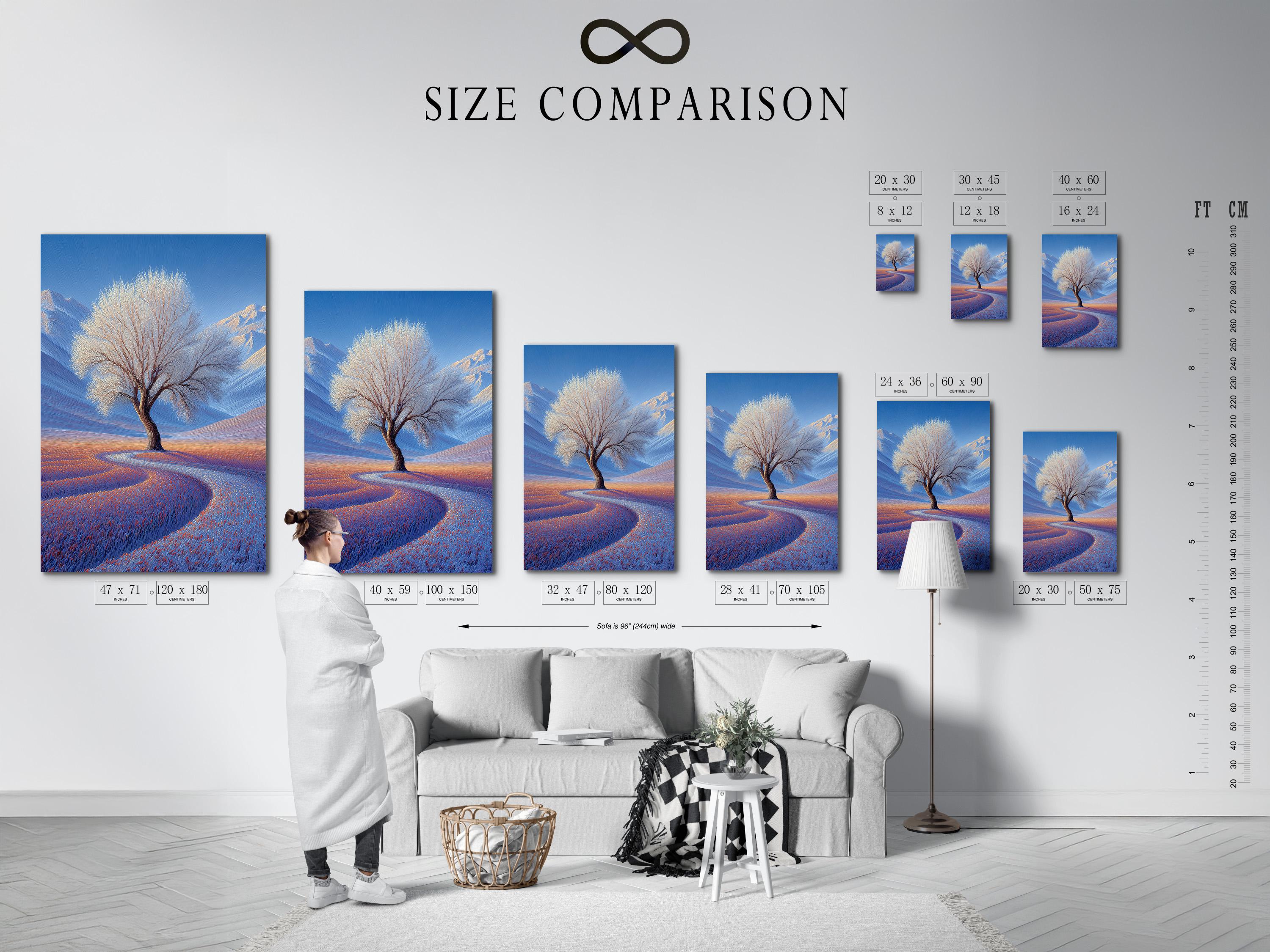 Lone leafless tree in a blue winter landscape with snowy hills and a warm orange horizon glow detail view