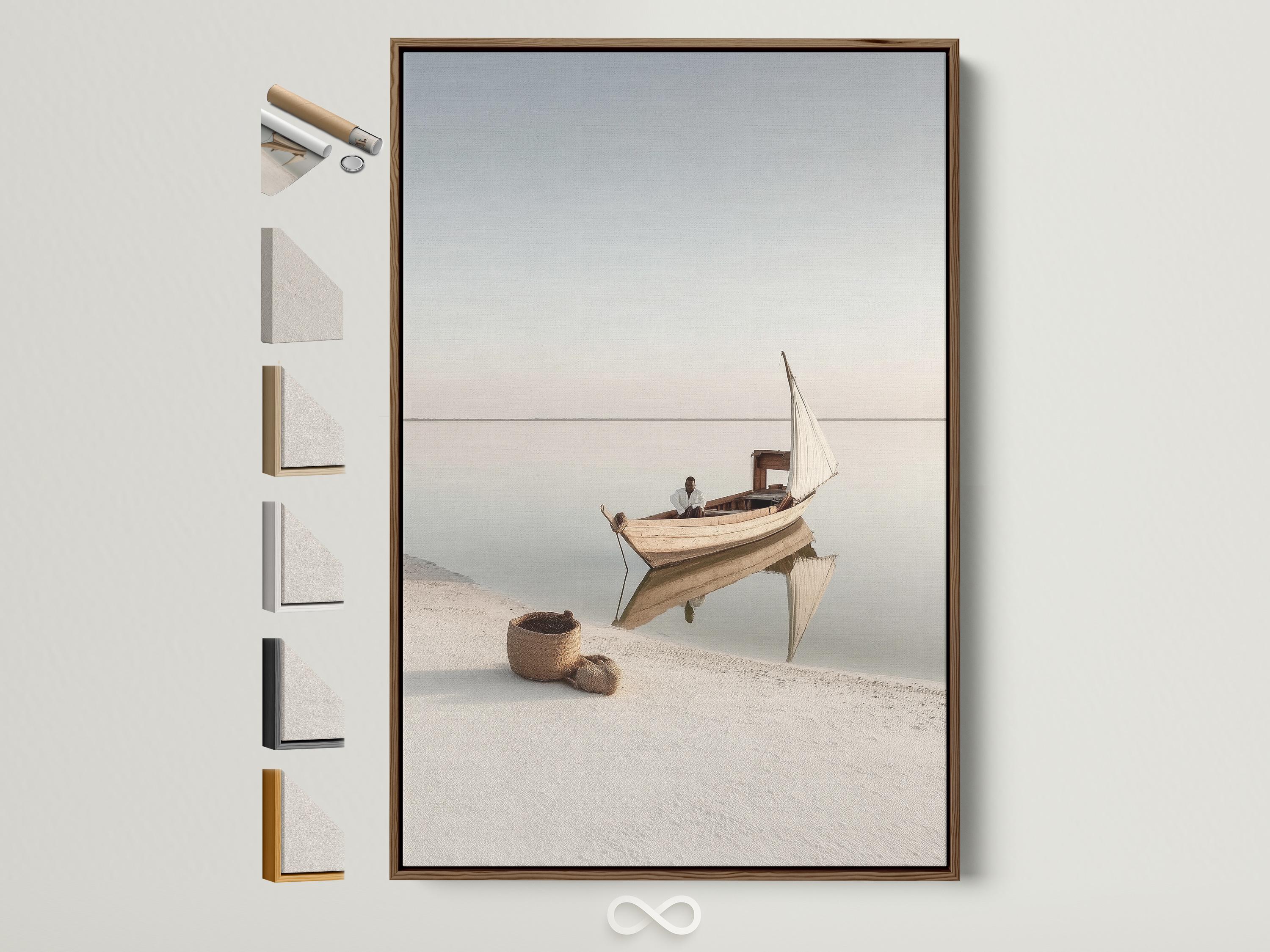 Neutral sailboat seascape with a pale sail on calm water and a hazy horizon
