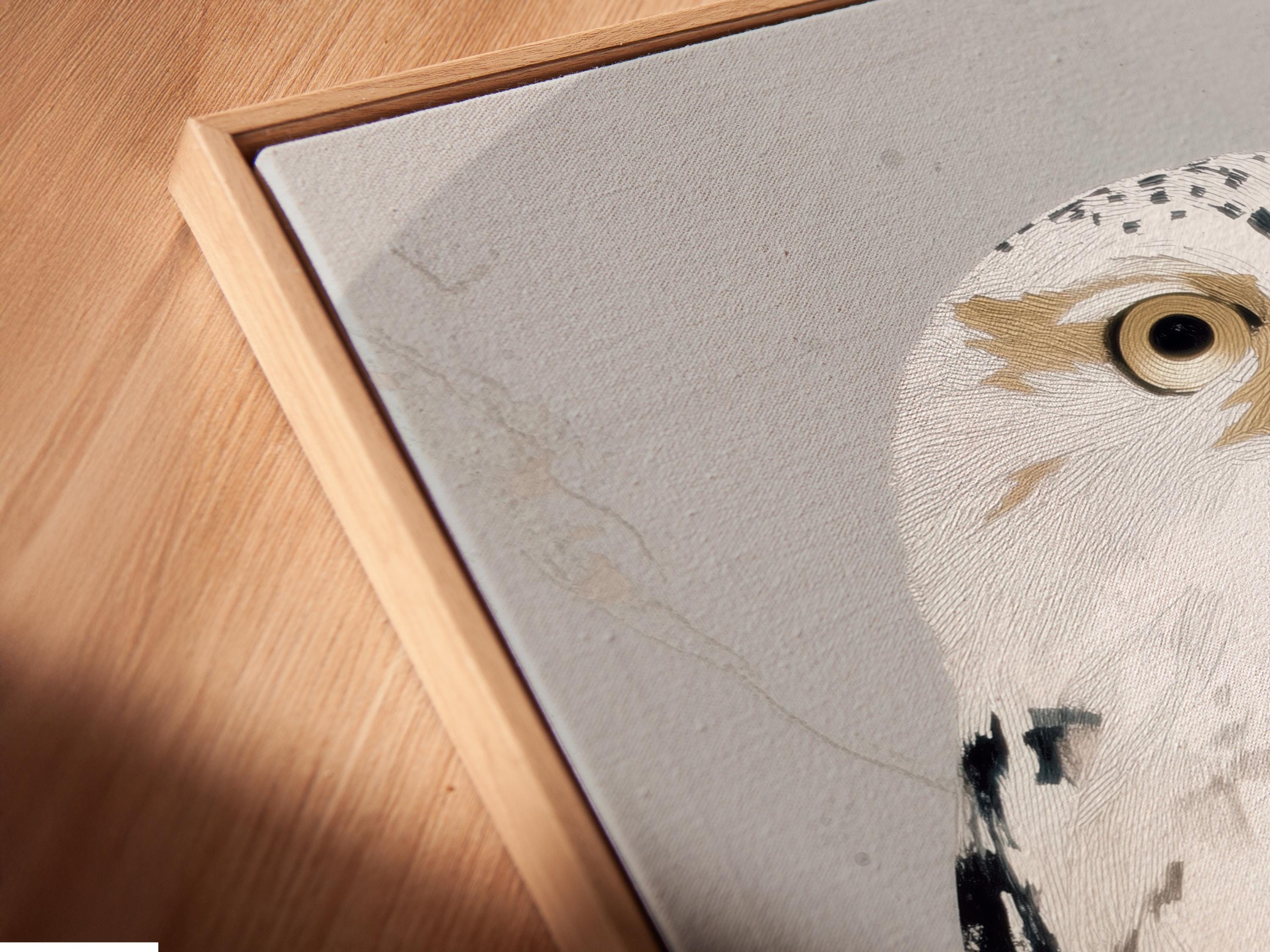 Neutral abstract owl portrait artwork with beige feathers and black speckled accents detail view
