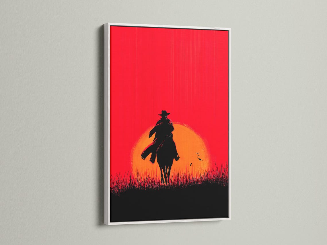 A framed artwork mockup showing a cowboy and horse silhouette at sunset against a red sky