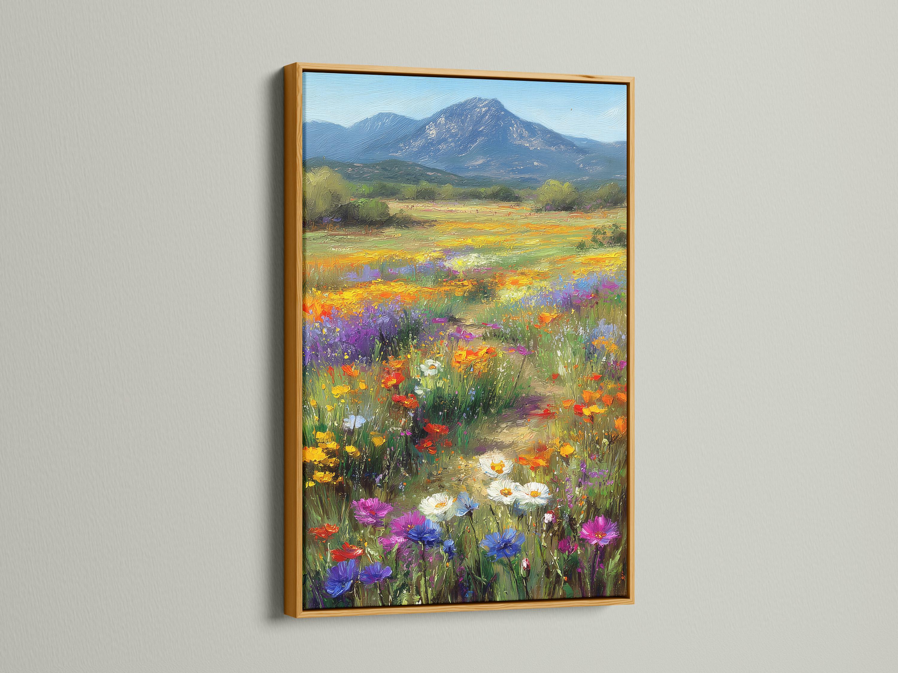 Wildflower meadow landscape with colourful flowers and a blue mountain detail view