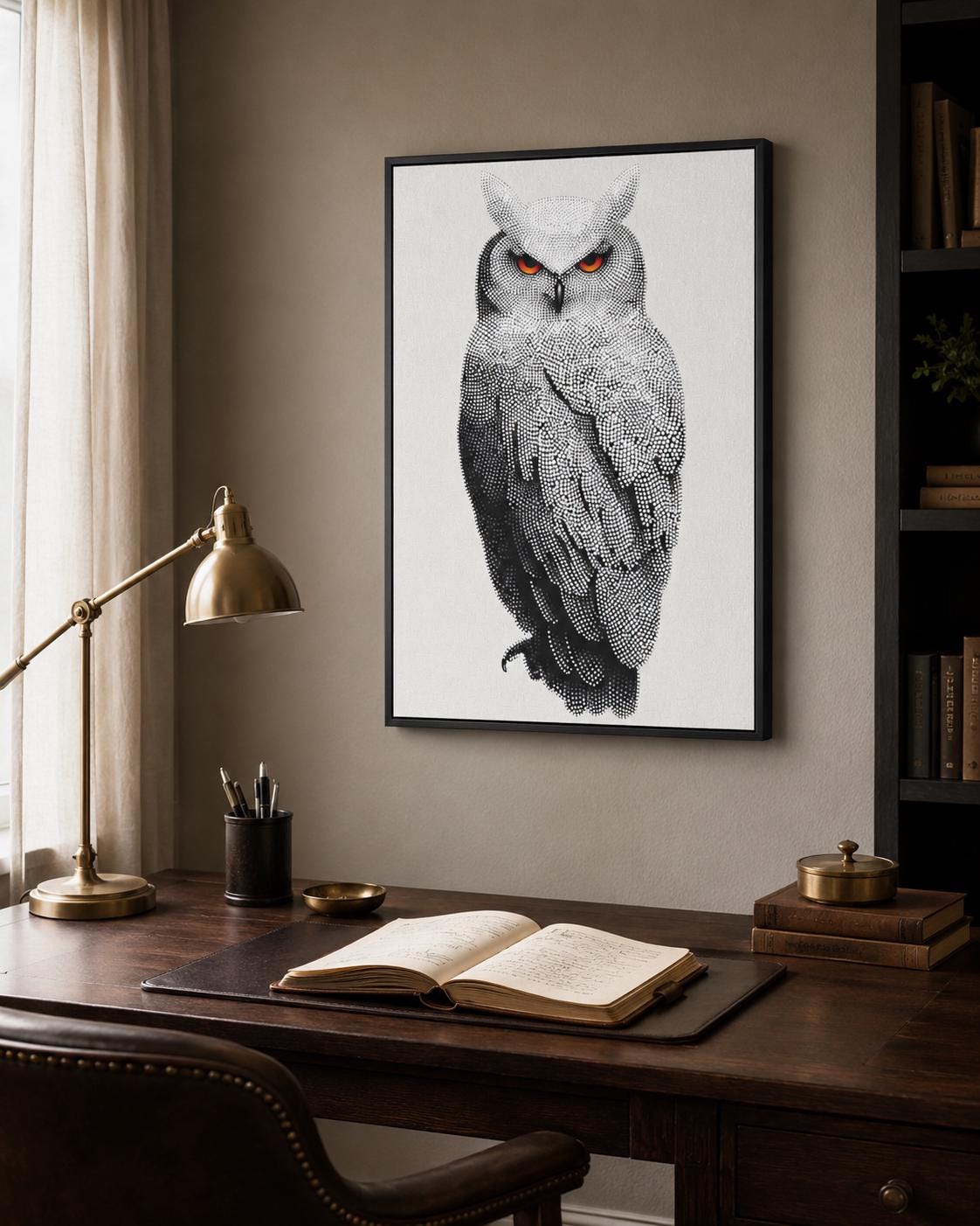 Dotted owl artwork in black and white with bright red-orange eyes detail view