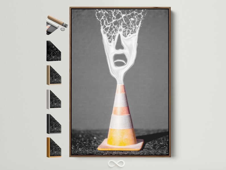 A surreal traffic cone stands on dark ground, its top appearing as a screaming white face with high-contrast, graphic detailing
