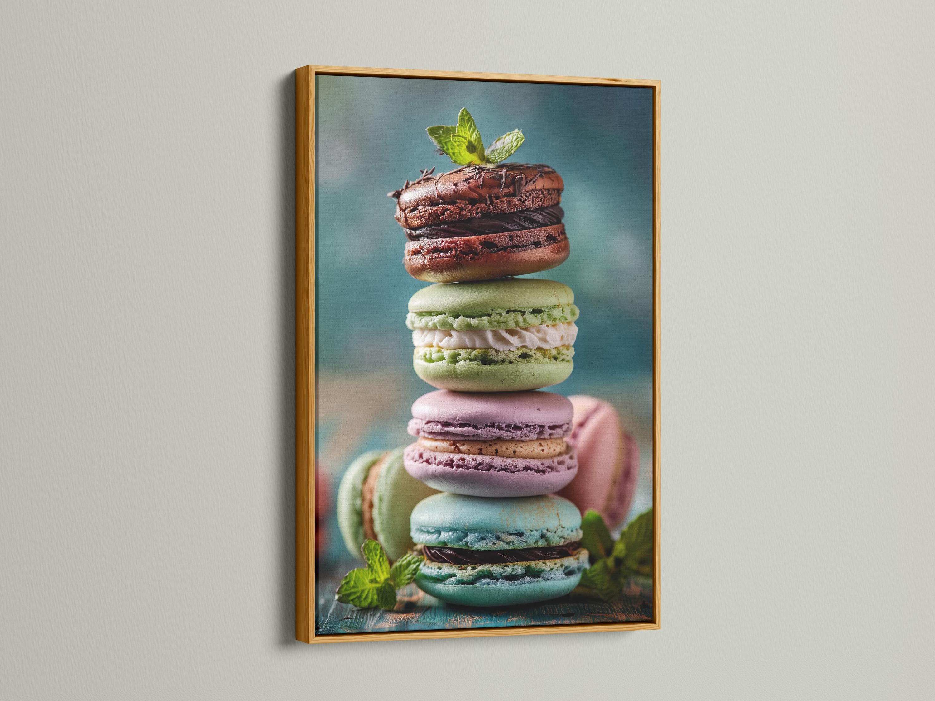 Close-up artwork of pastel macarons with mint leaves on a muted blue background