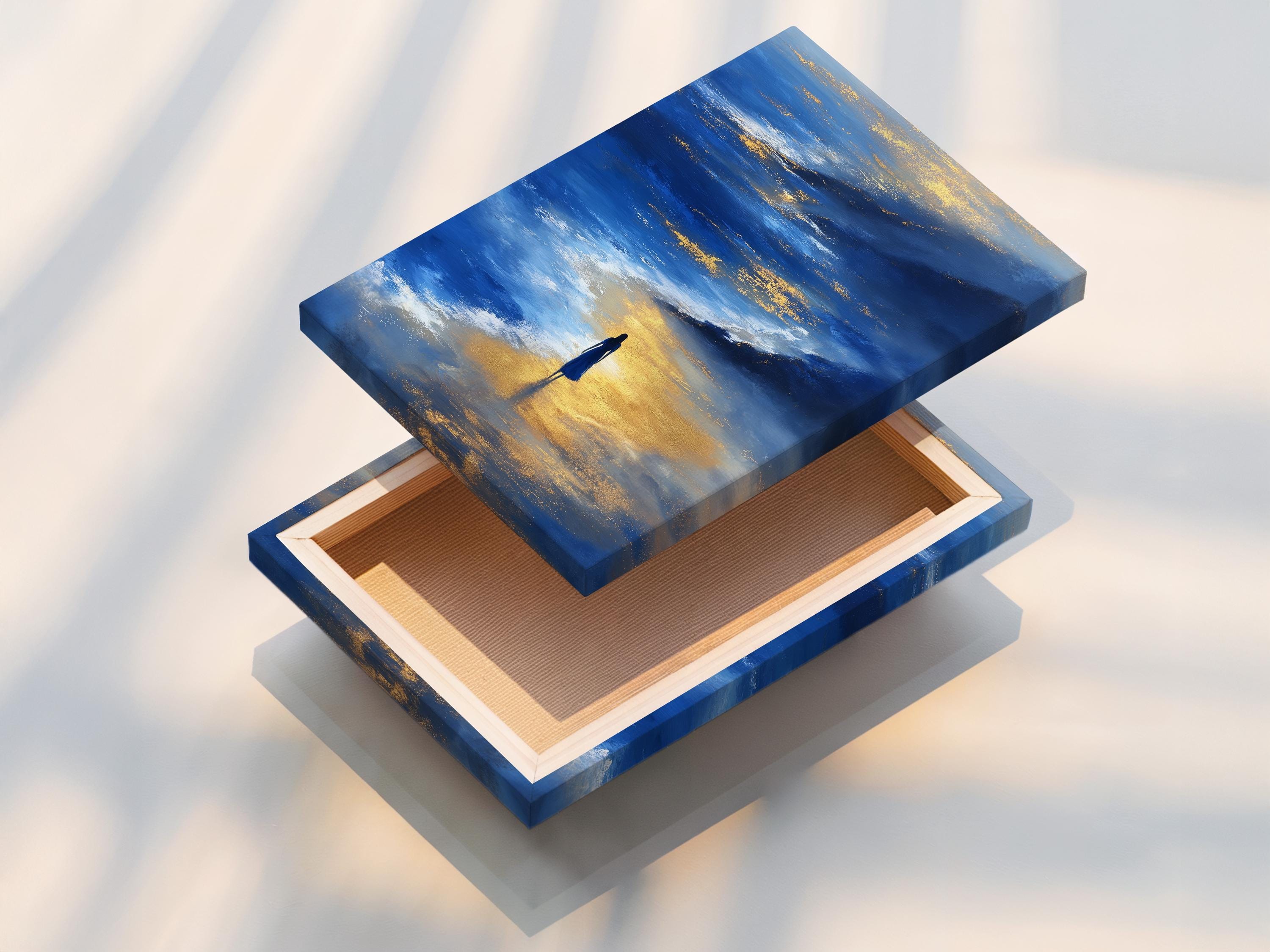 Blue and gold seascape artwork with layered ocean waves, a solitary figure, and a reflection detail view