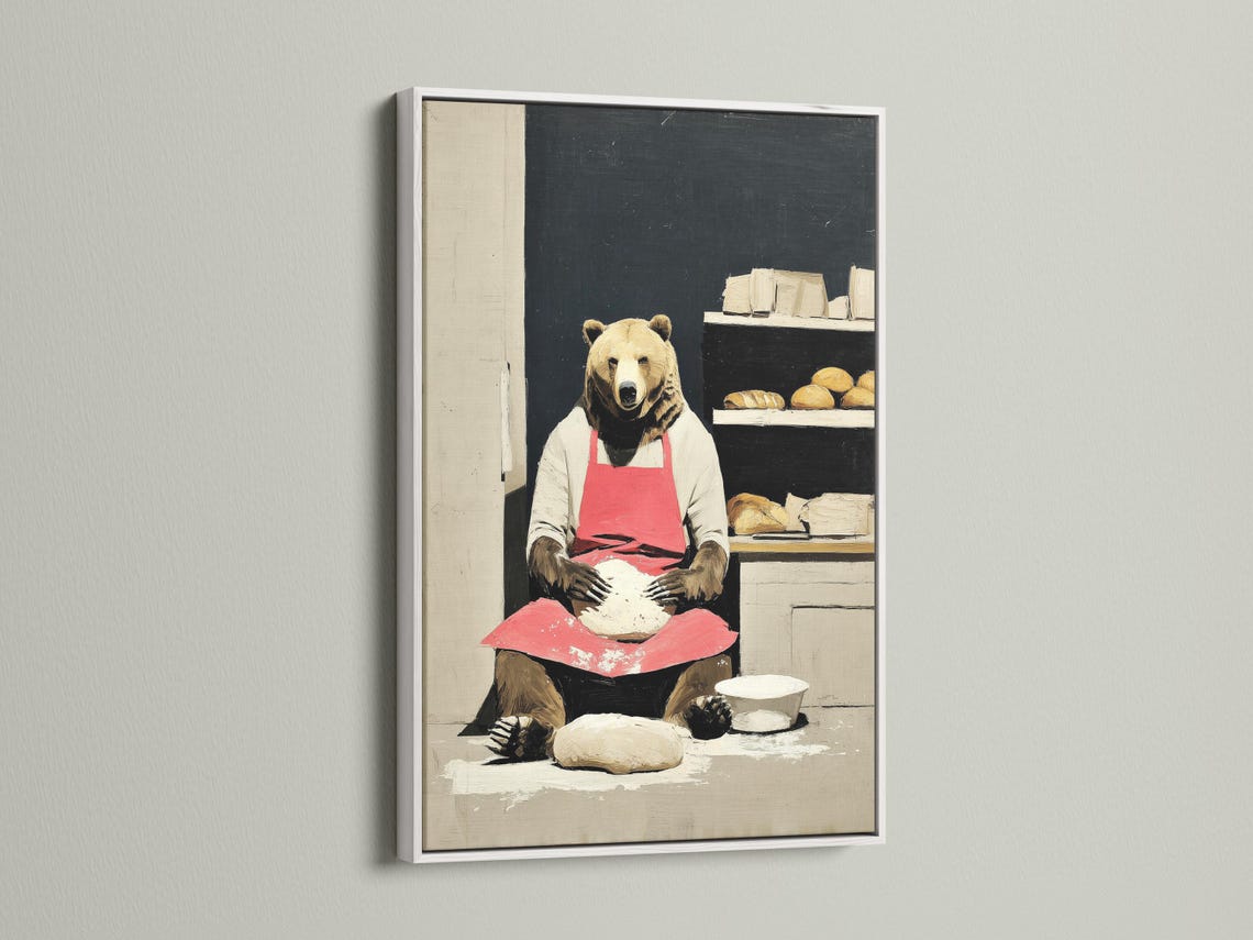 Bear chef wall artwork shown in a room mockup with multiple frame colour options