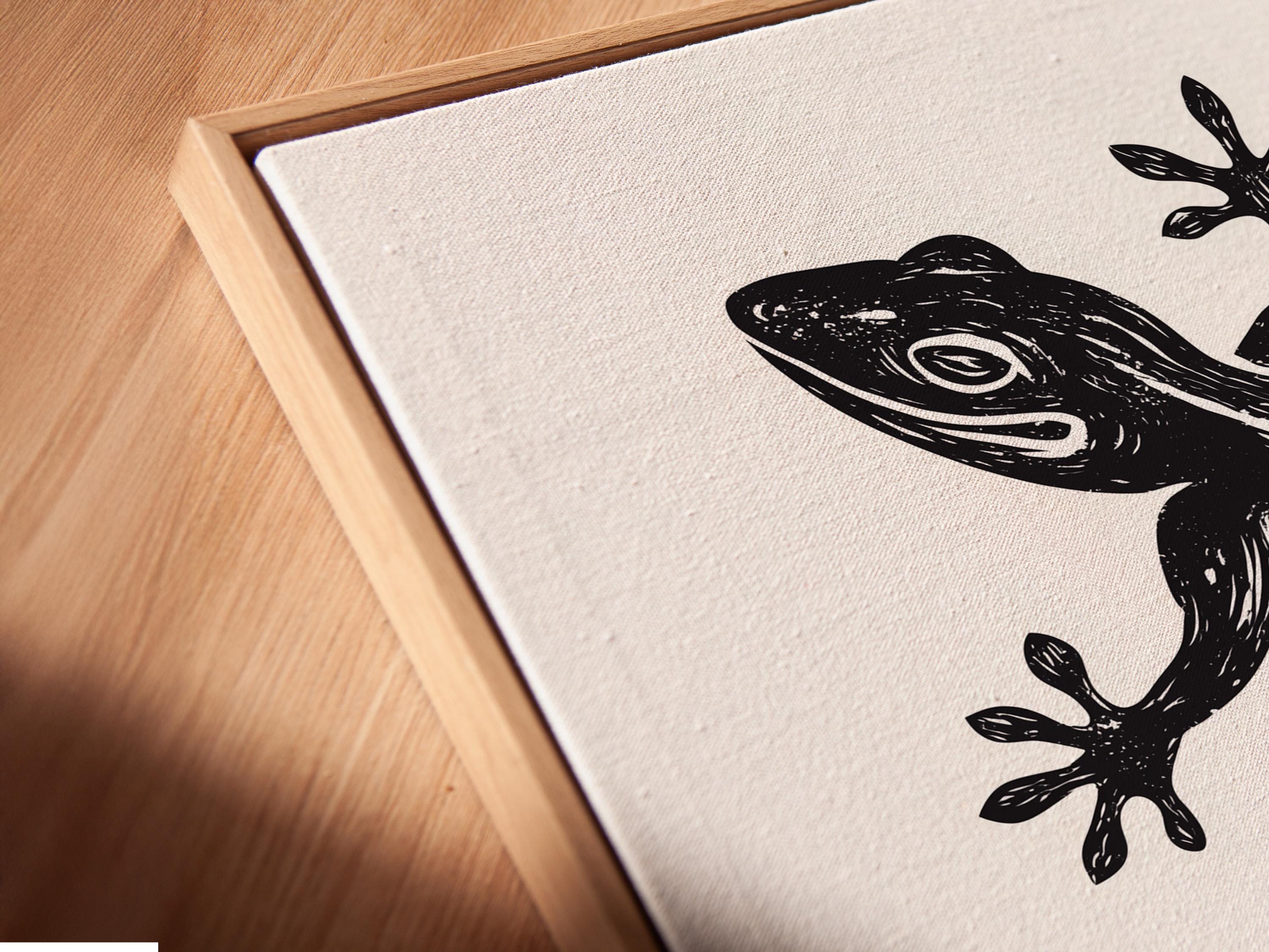Room mockup showing framed lizard illustration on a wall with small red seal detail