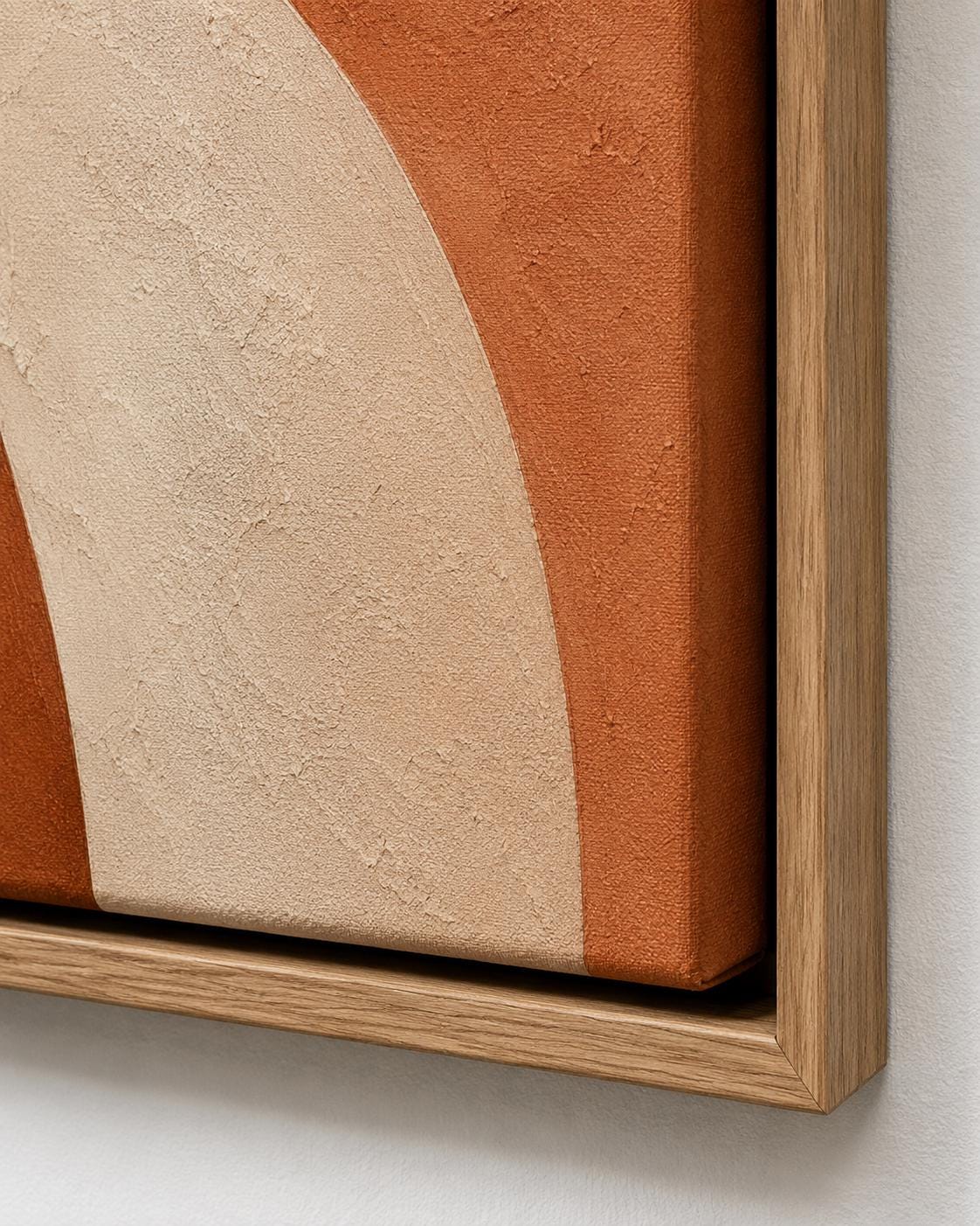 Living room mockup with three terracotta and beige abstract panels above a sofa