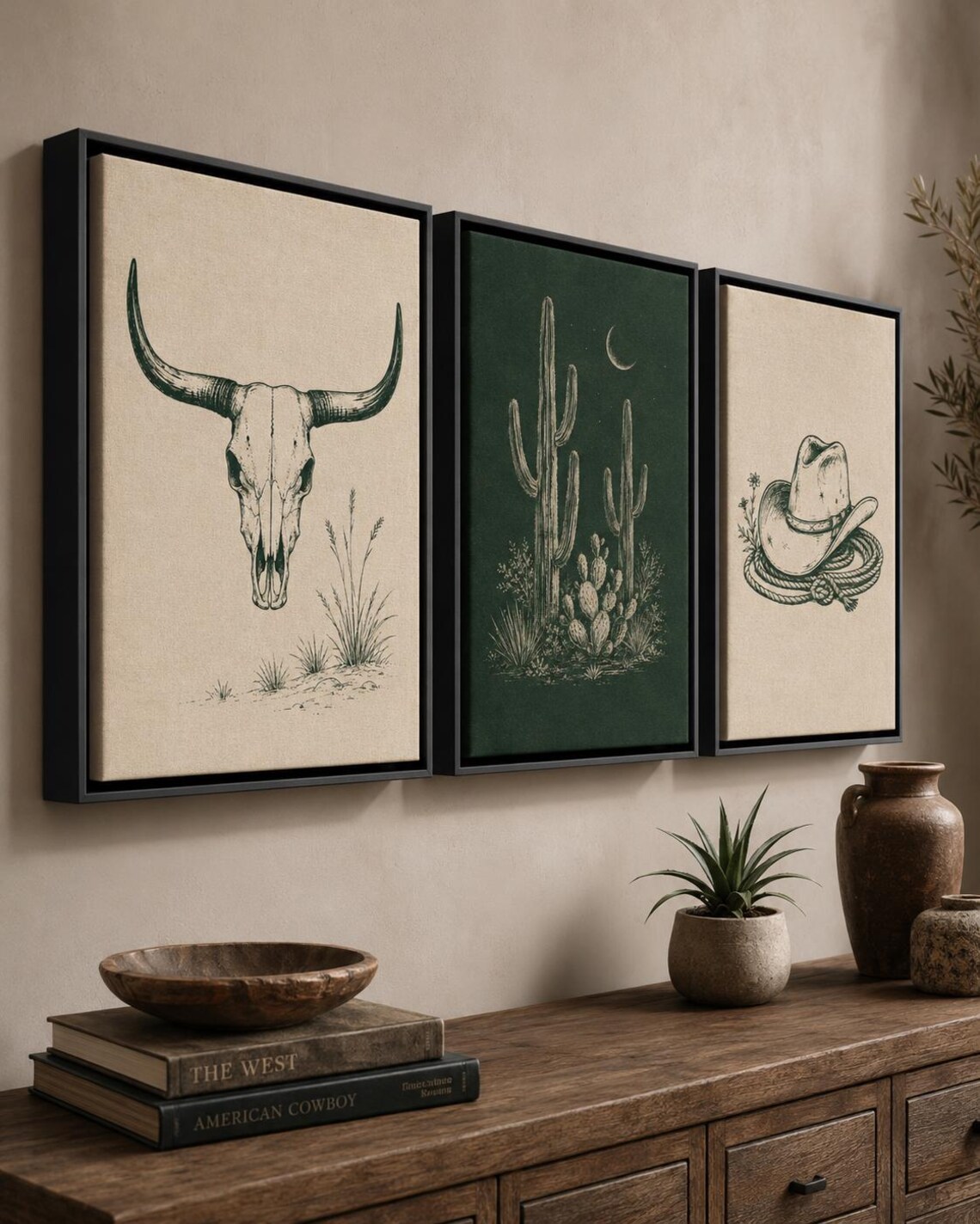 Western framed wall art set displayed above a wooden sideboard with a person standing nearby