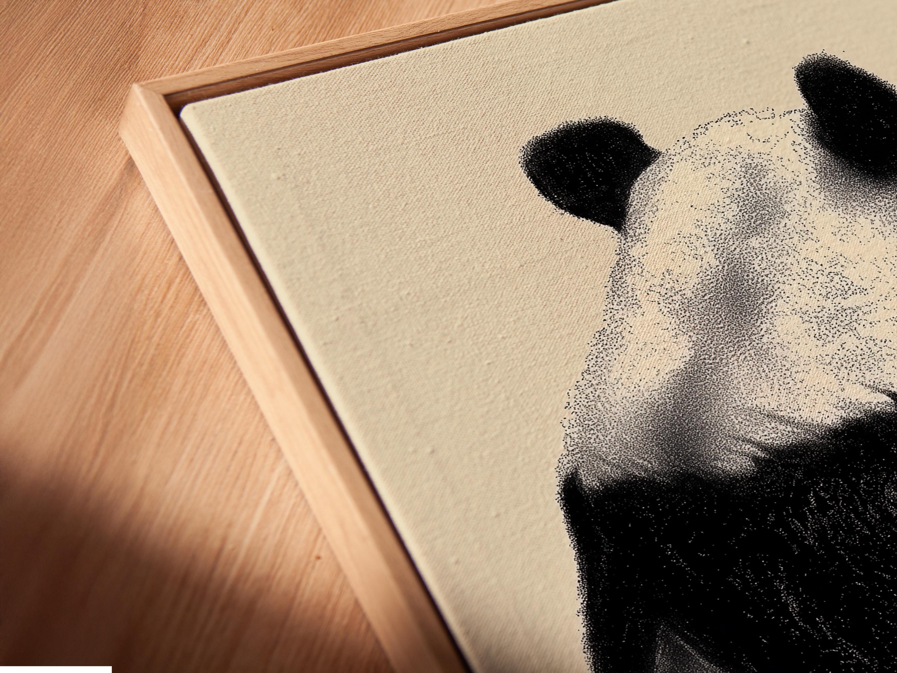 Wall mockup showing a framed panda portrait artwork in black and beige