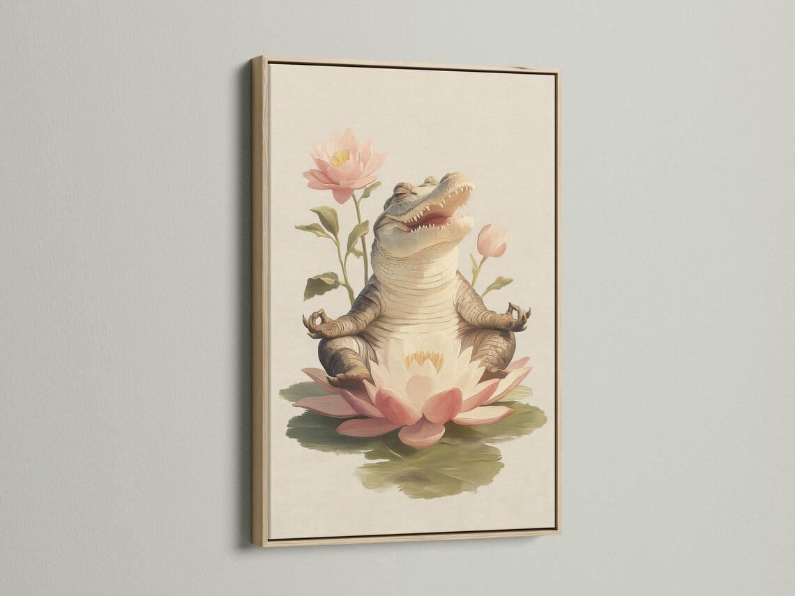 Grey alligator resting on pale pink and cream lotus flowers with green leaves on a light background detail view