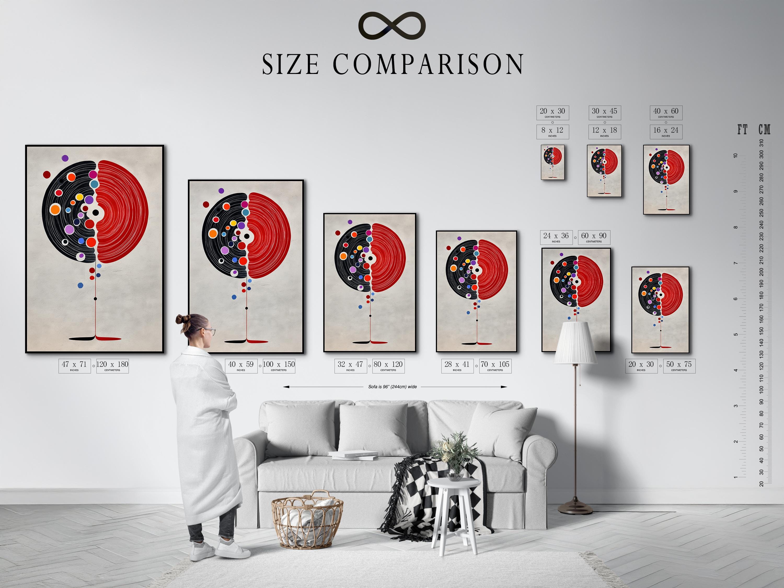 Abstract split circle design with red and black concentric arcs and colourful dot accents detail view