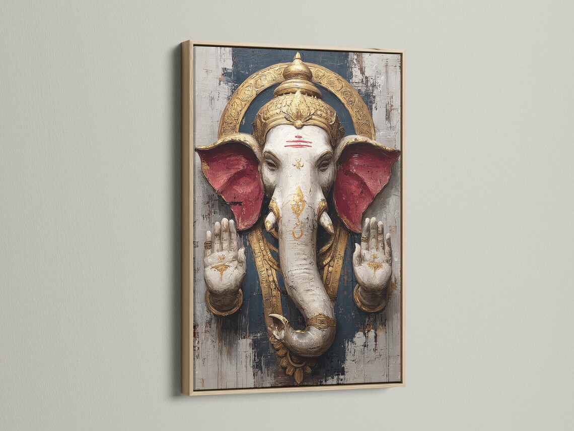 Stylised elephant-headed deity figure with gold crown and red wing-like shapes on a textured charcoal background detail view