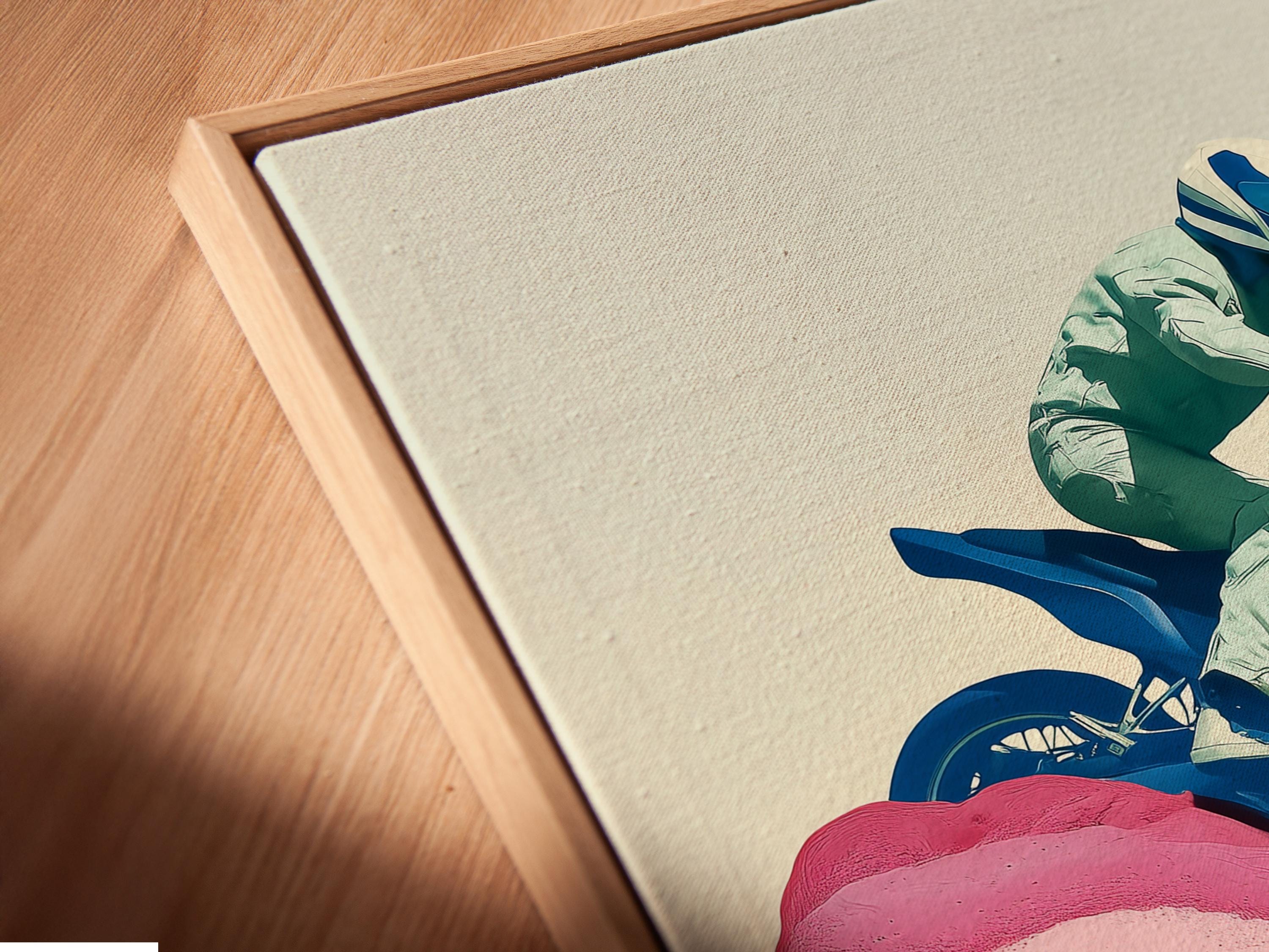 Framed wall mockup showing a stylised blue motorcycle rider over pink and orange mountain ridges