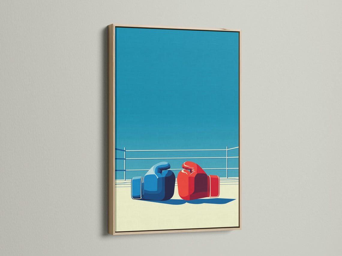 Wall mockup showing a framed boxing ring artwork with blue and red gloves and white ropes