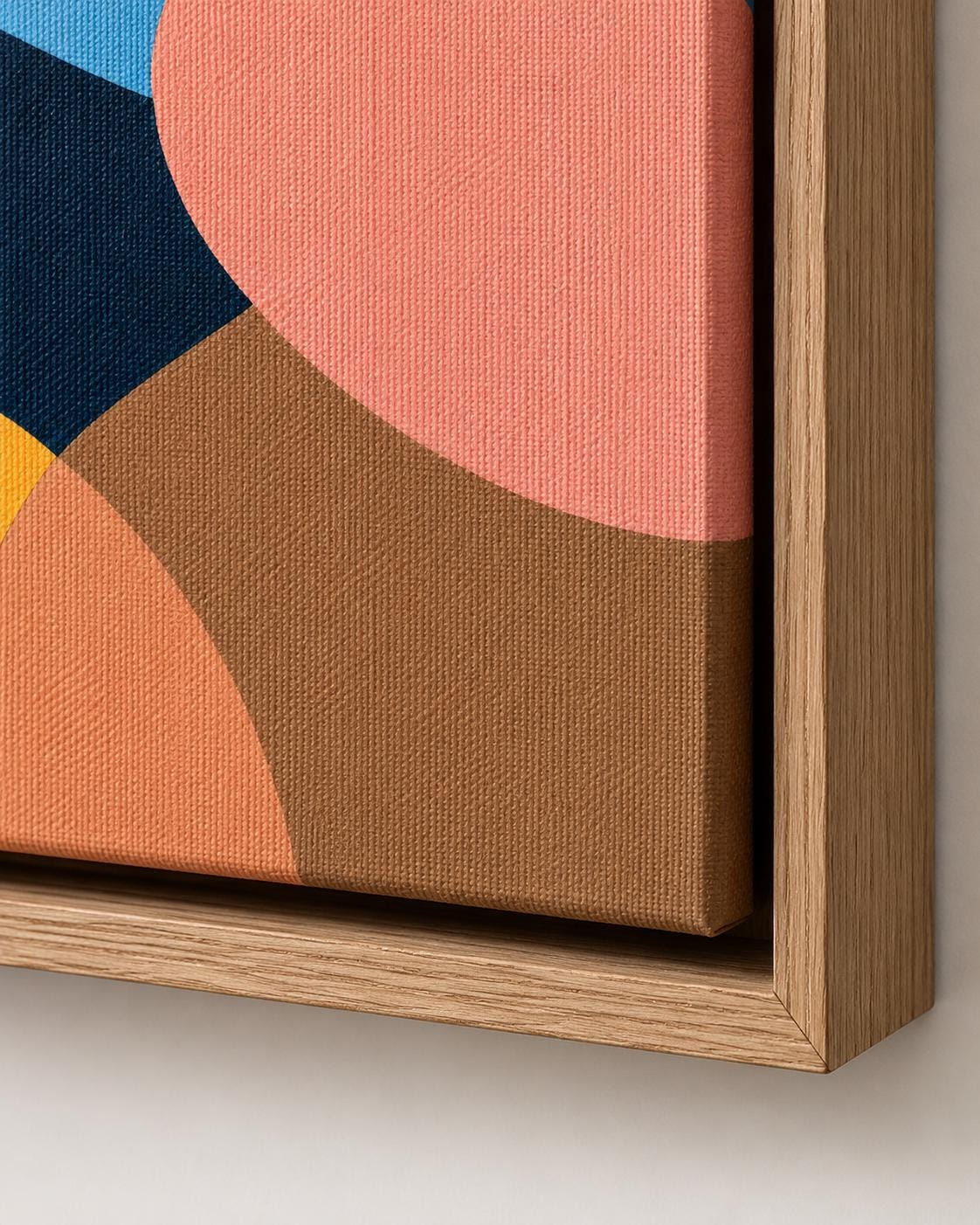 Room mockup with three abstract portrait artworks in multicolour tones above a bed and desk
