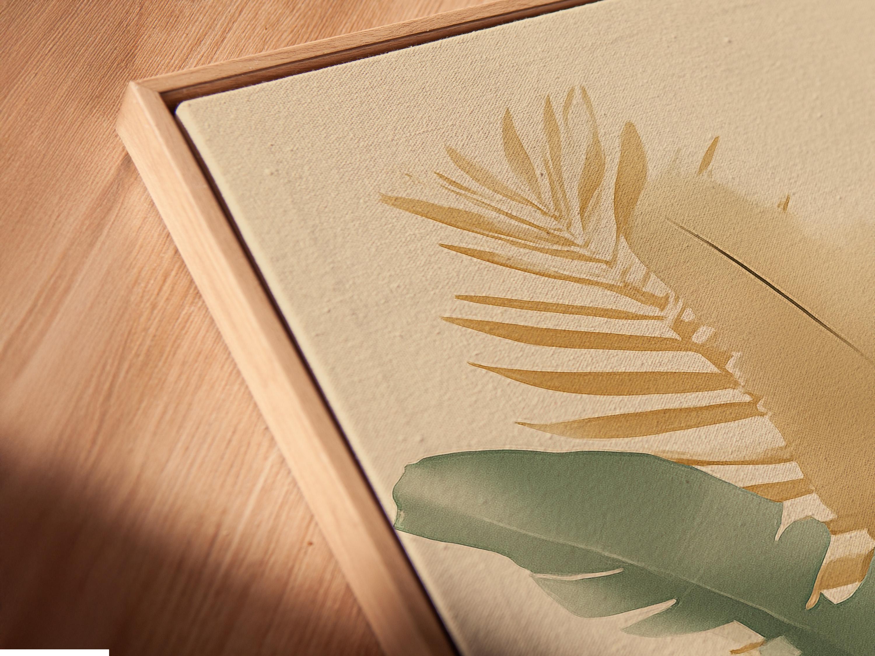 Room mockup showing framed botanical artwork with tropical leaves in cream and green