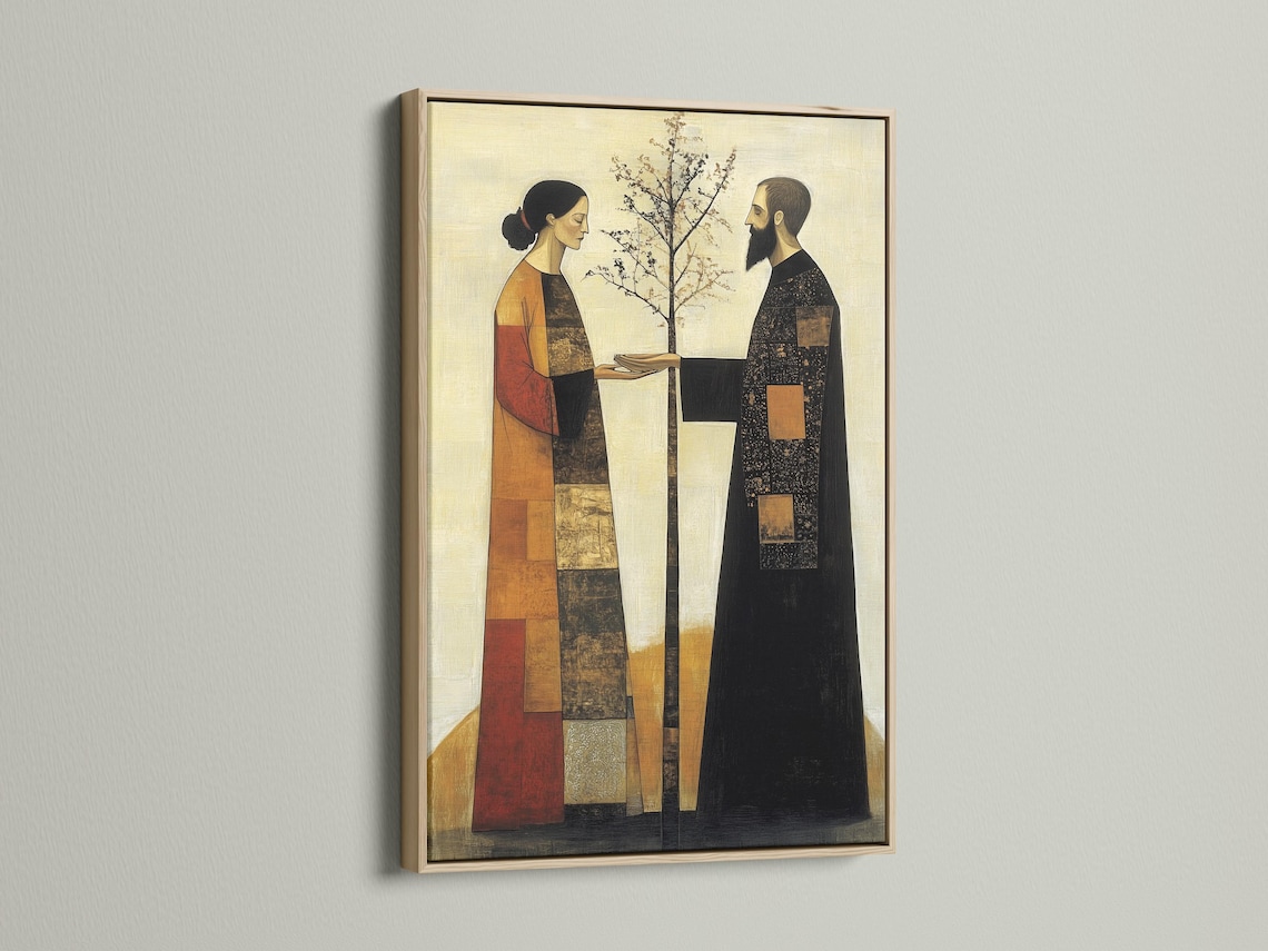 A framed artwork mockup showing a folk-art couple facing each other with a tree at the centre on a pale background