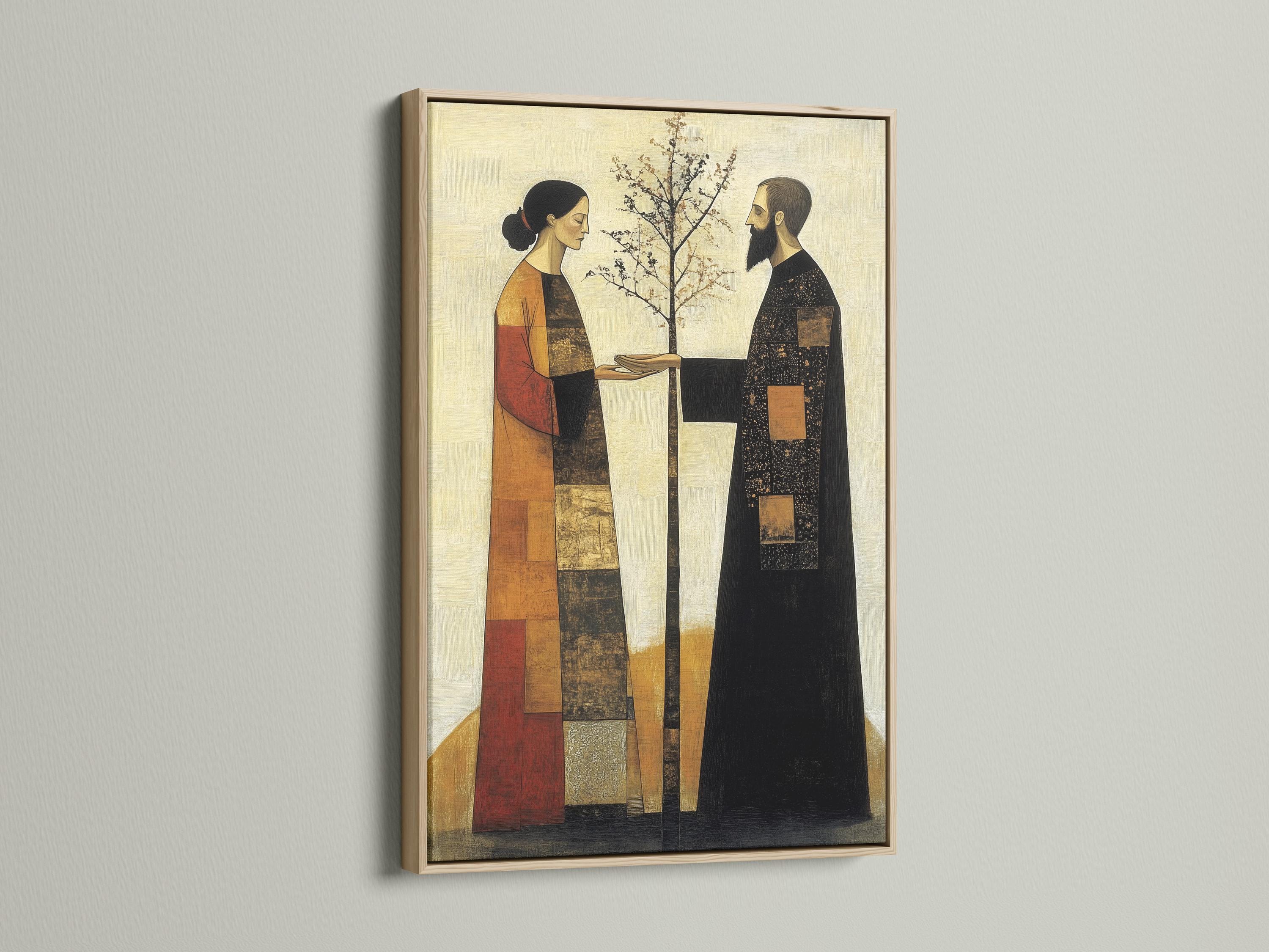 A framed artwork mockup showing a folk-art couple facing each other with a tree at the centre on a pale background