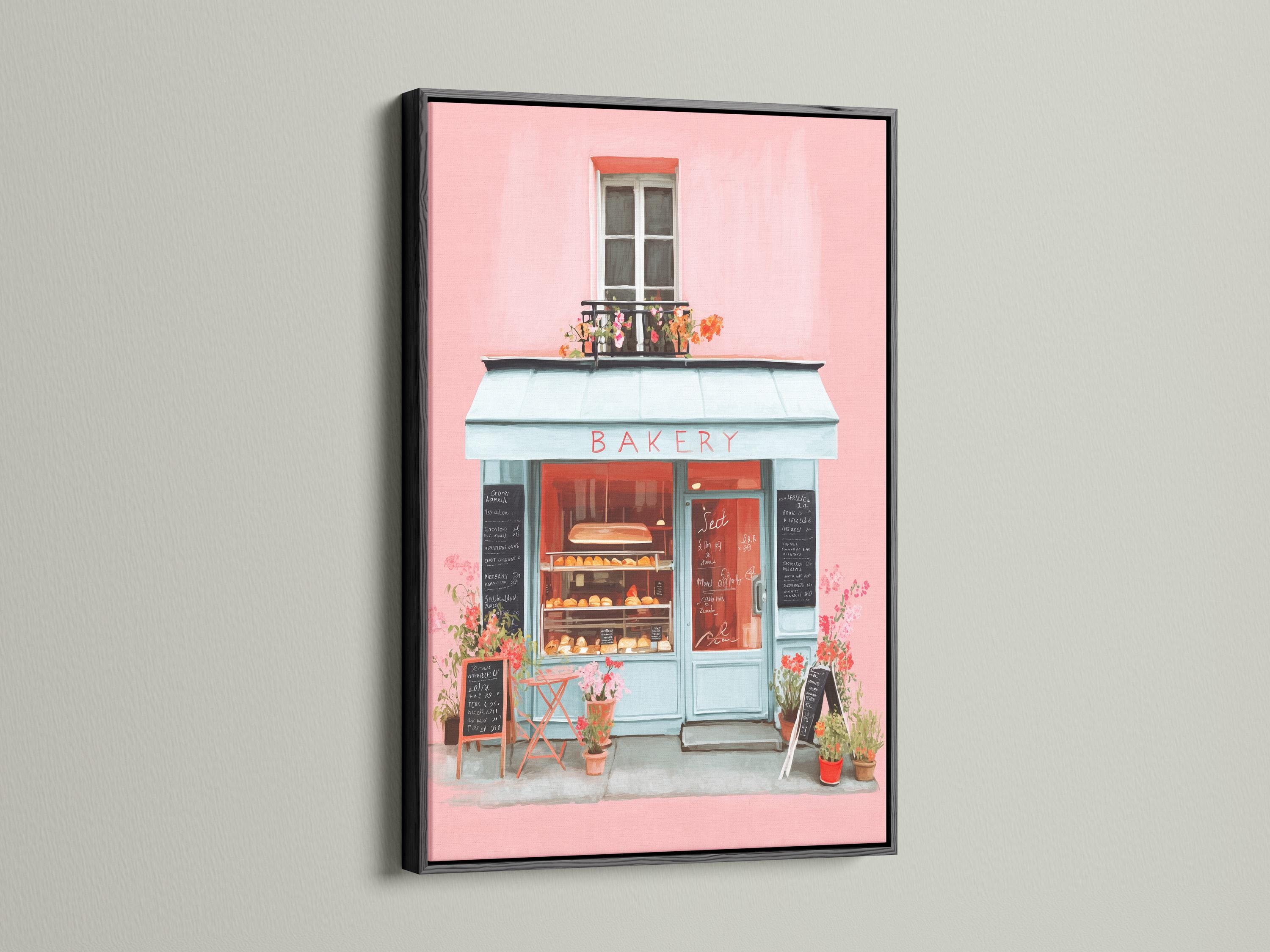 Room mockup showing a framed pastel bakery shopfront illustration