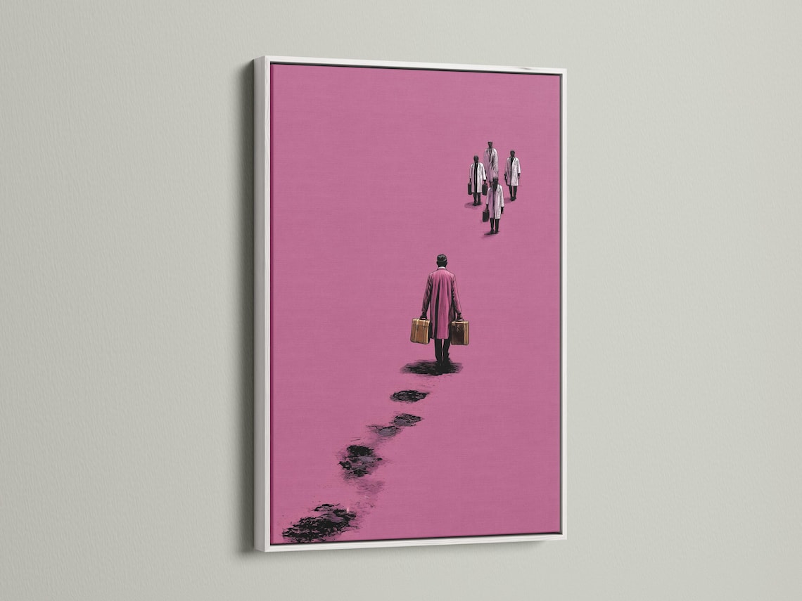 Mockup showing a framed pink minimalist traveller figure artwork on a light background