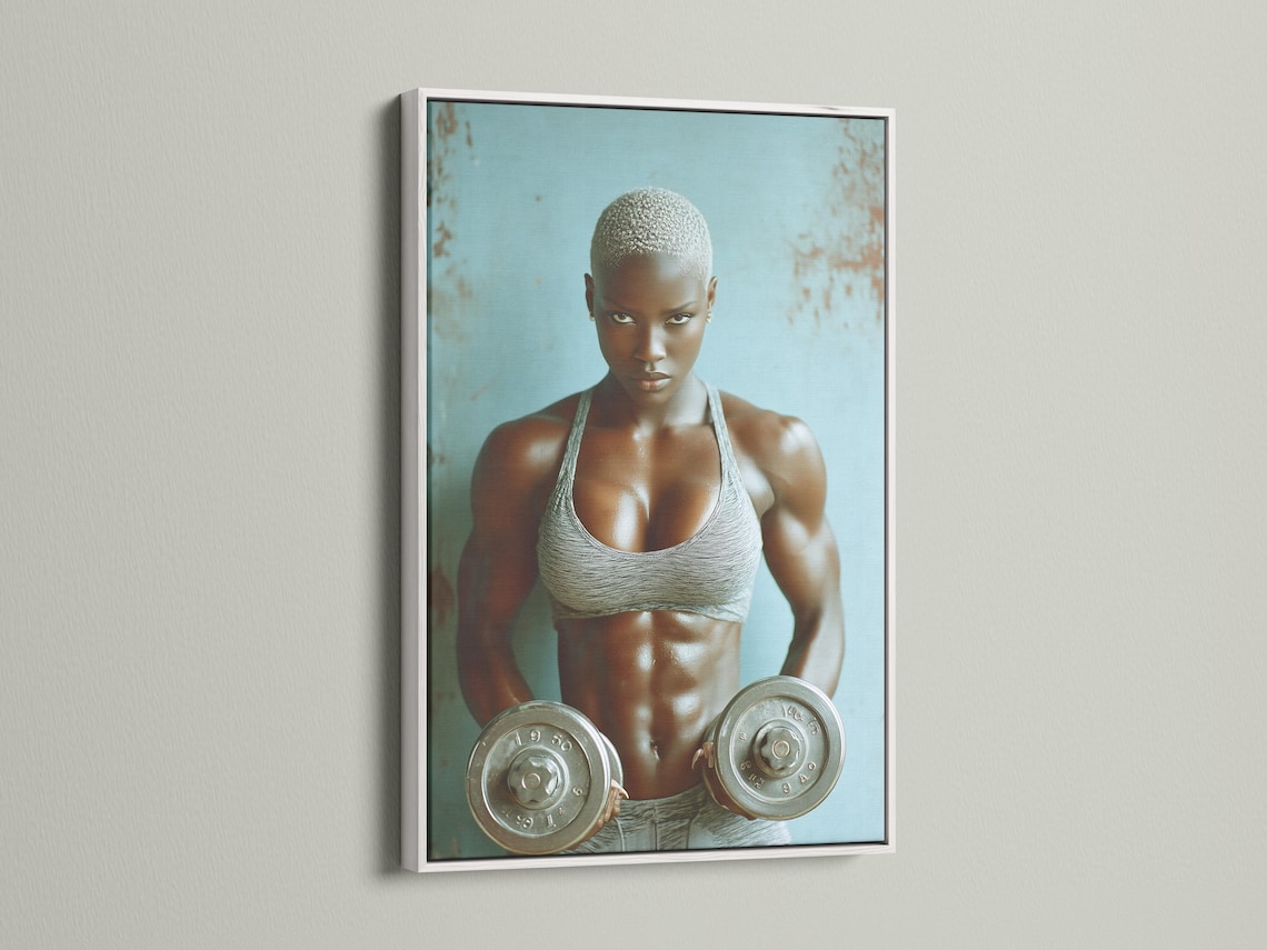 Room mockup showing a framed teal fitness portrait of an athletic woman holding weight plates