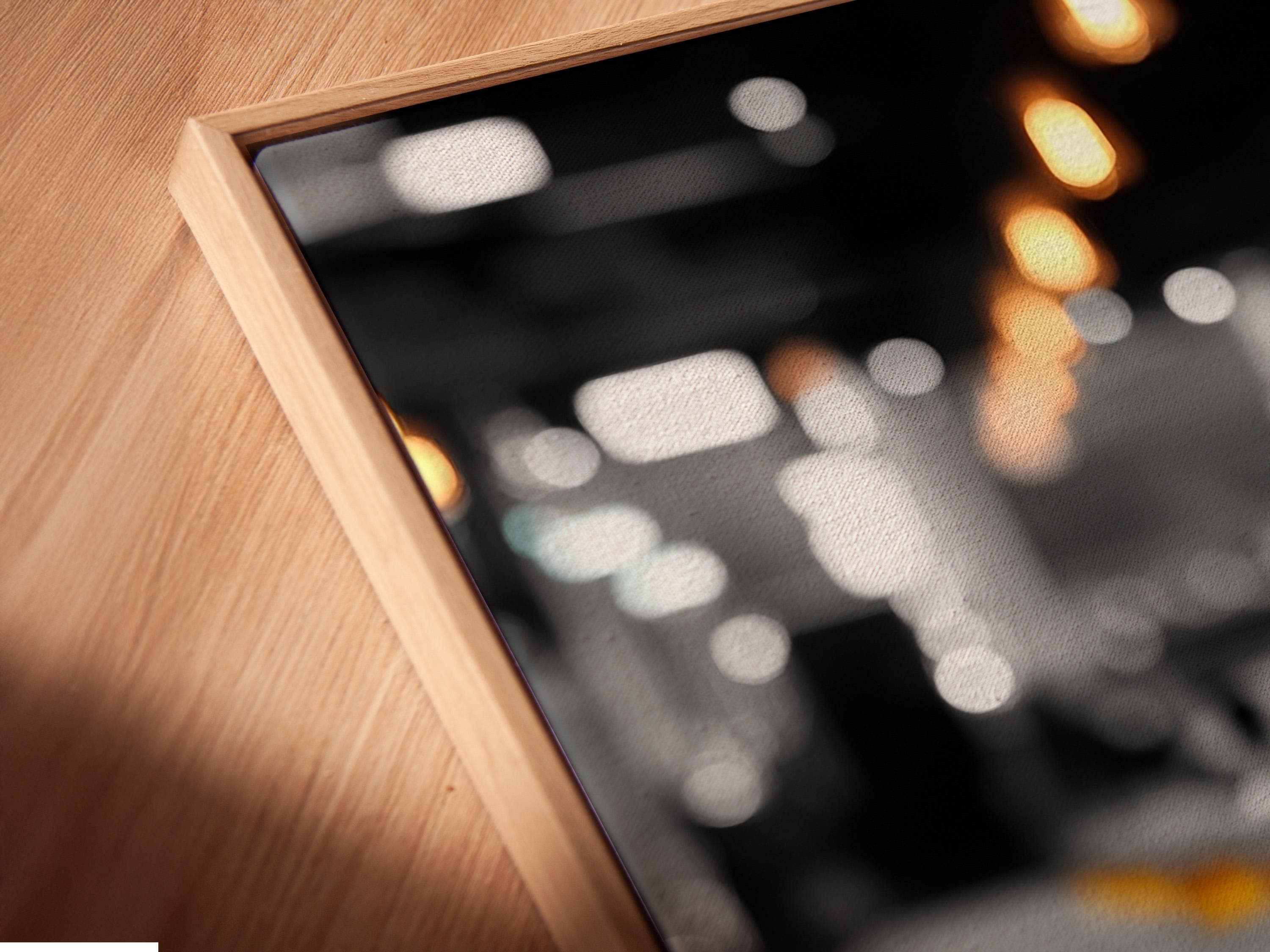 Room mockup showing a wall with framed artwork of a pub scene bottle with amber light accents