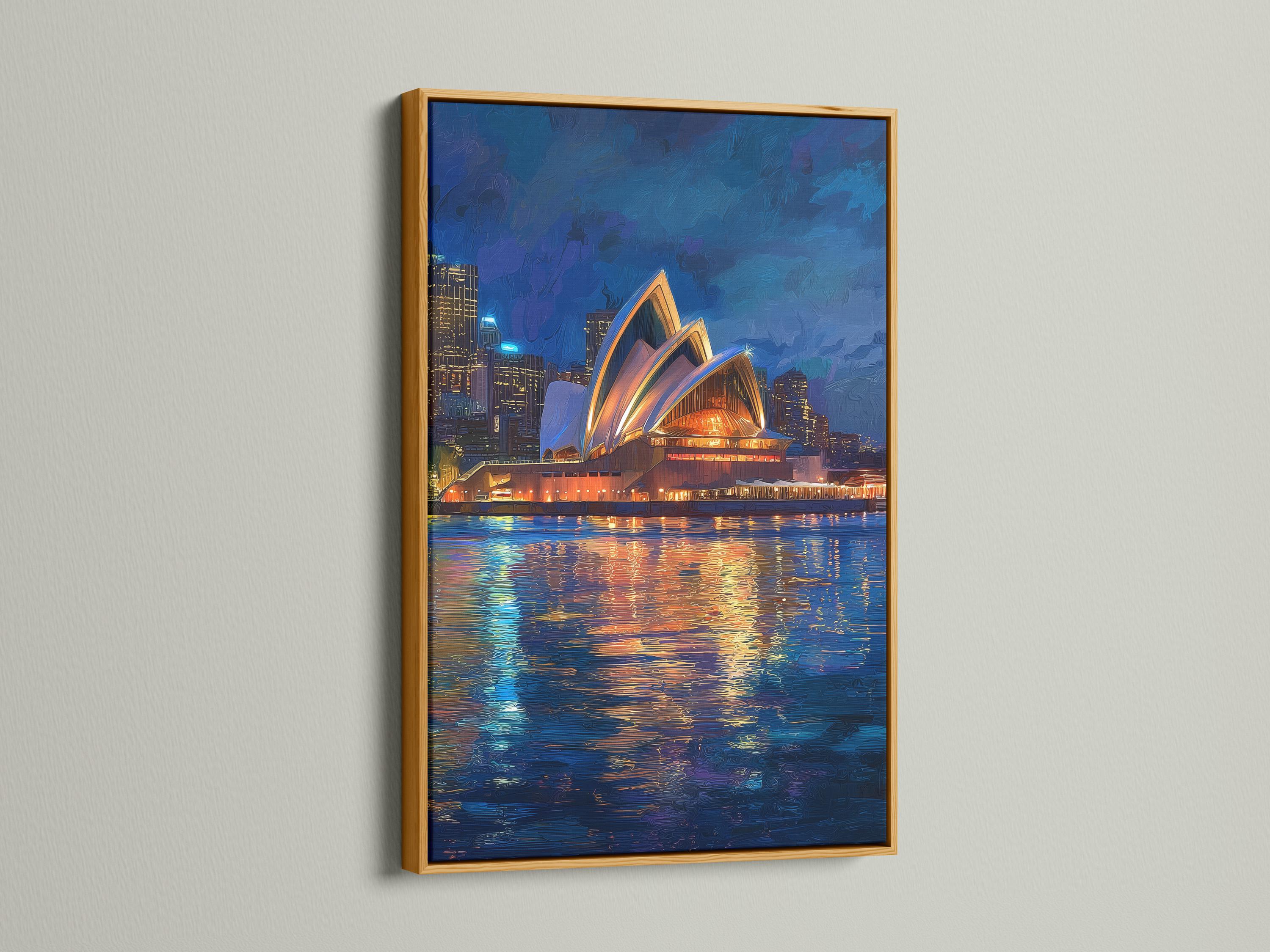 Framed night cityscape artwork featuring a glowing building and reflected lights on water