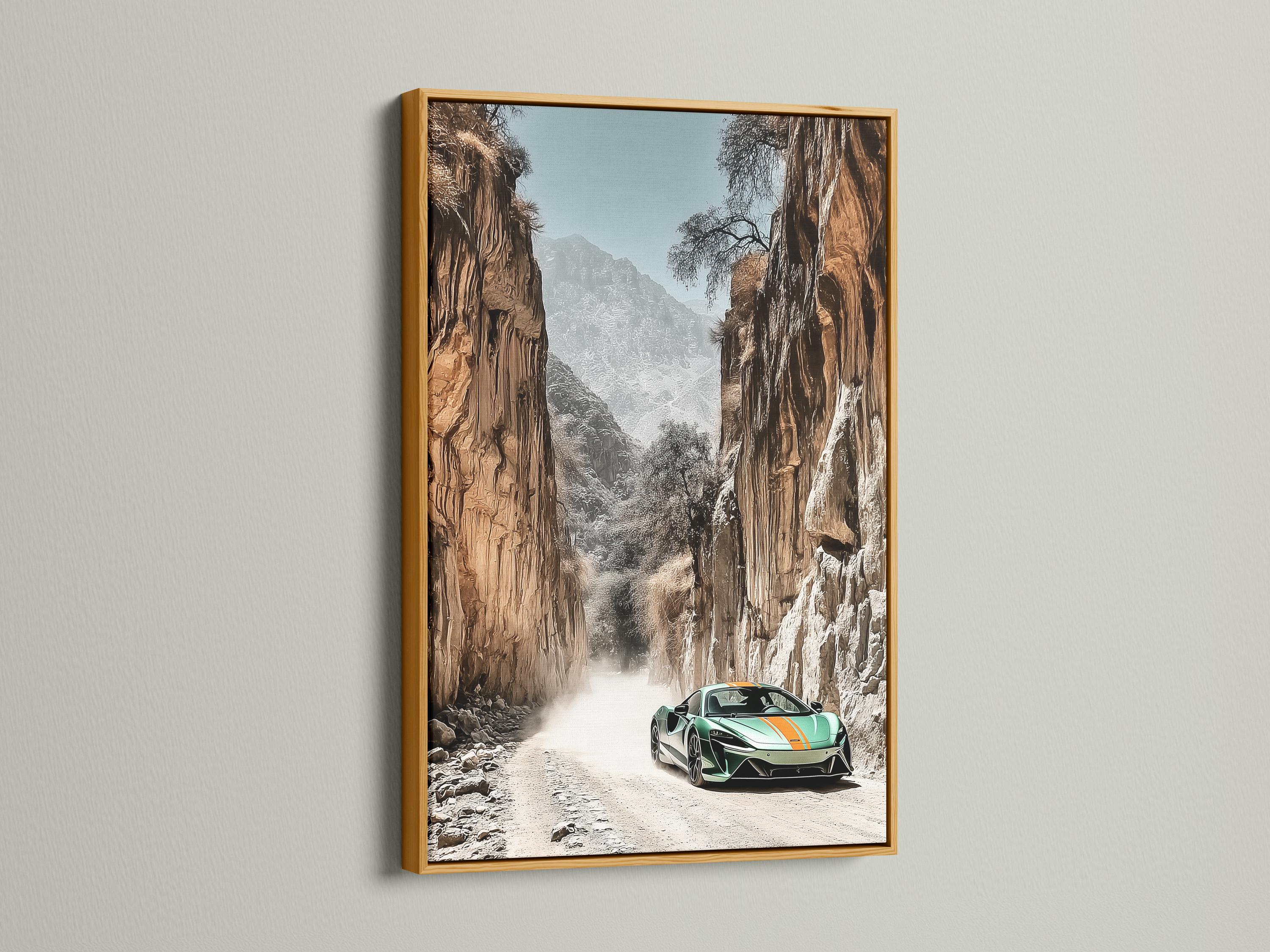 Green sports car on a sandy path in a rocky desert canyon with misty mountains detail view